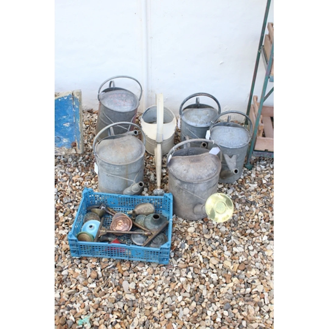 Collection of six early 20th century galvanised steel wateri...