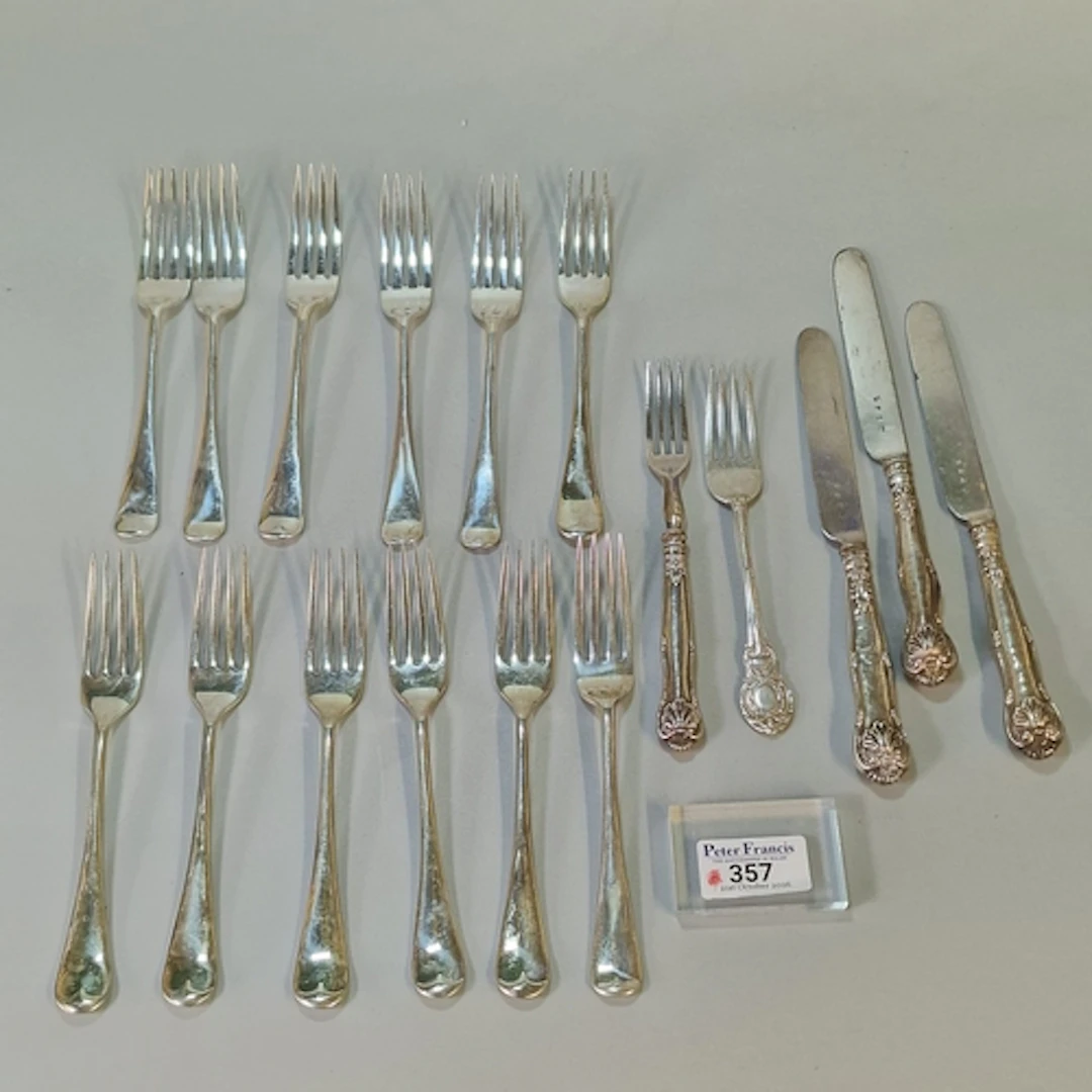 Collection of silver forks, 18.9 troy oz, together with a sm...