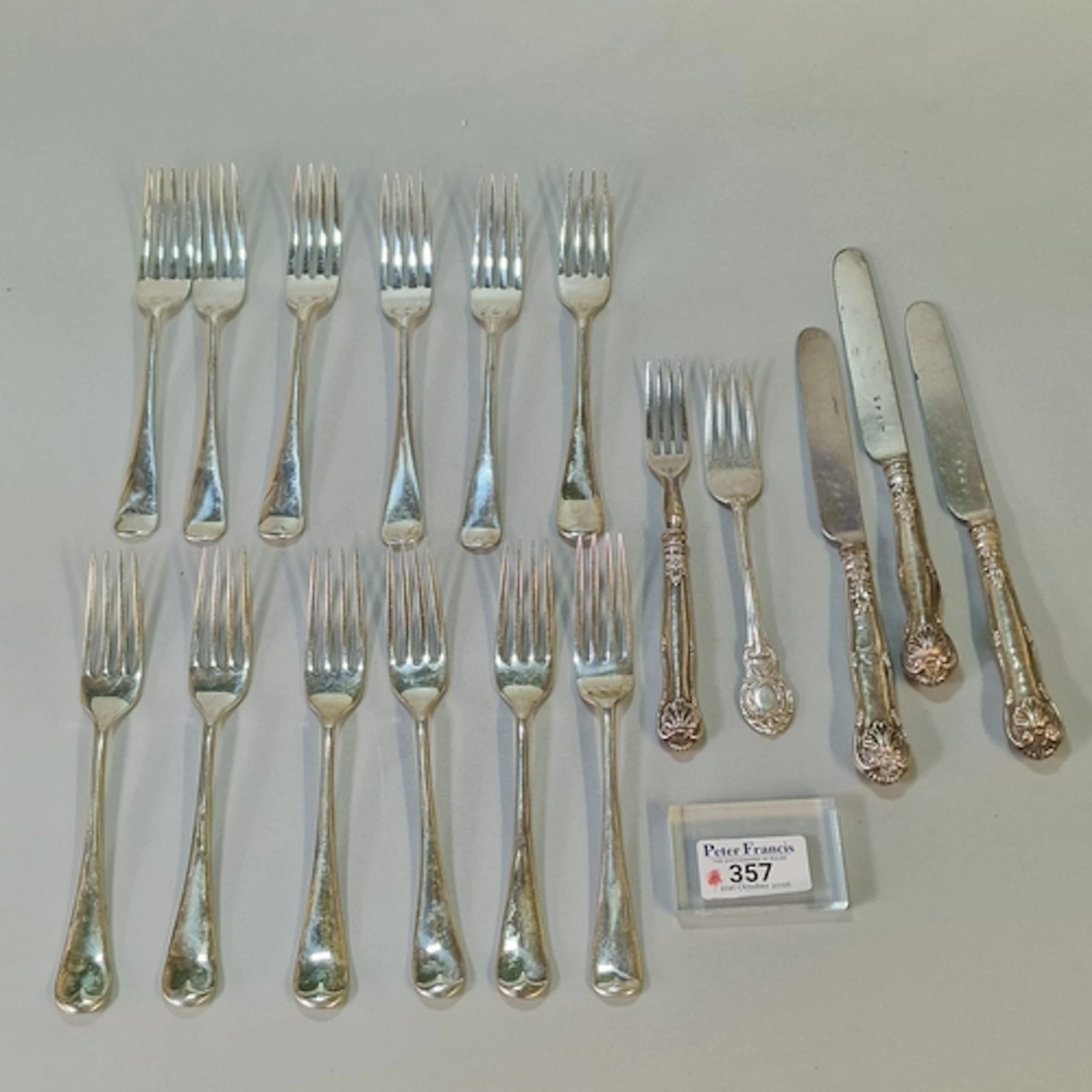 Collection of silver forks, 18.9 troy oz, together with a sm...