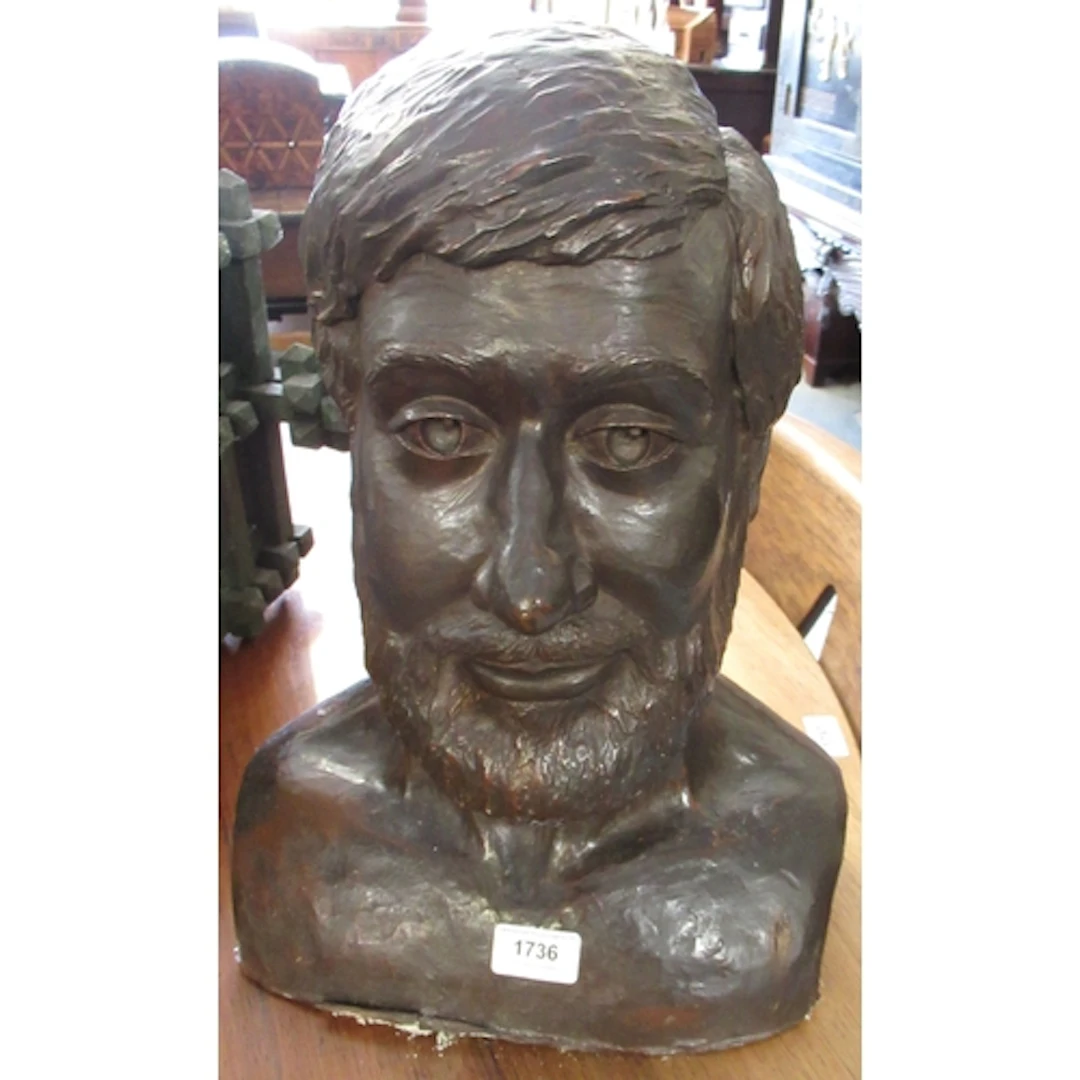 Brown patinated plaster bust of a bearded man