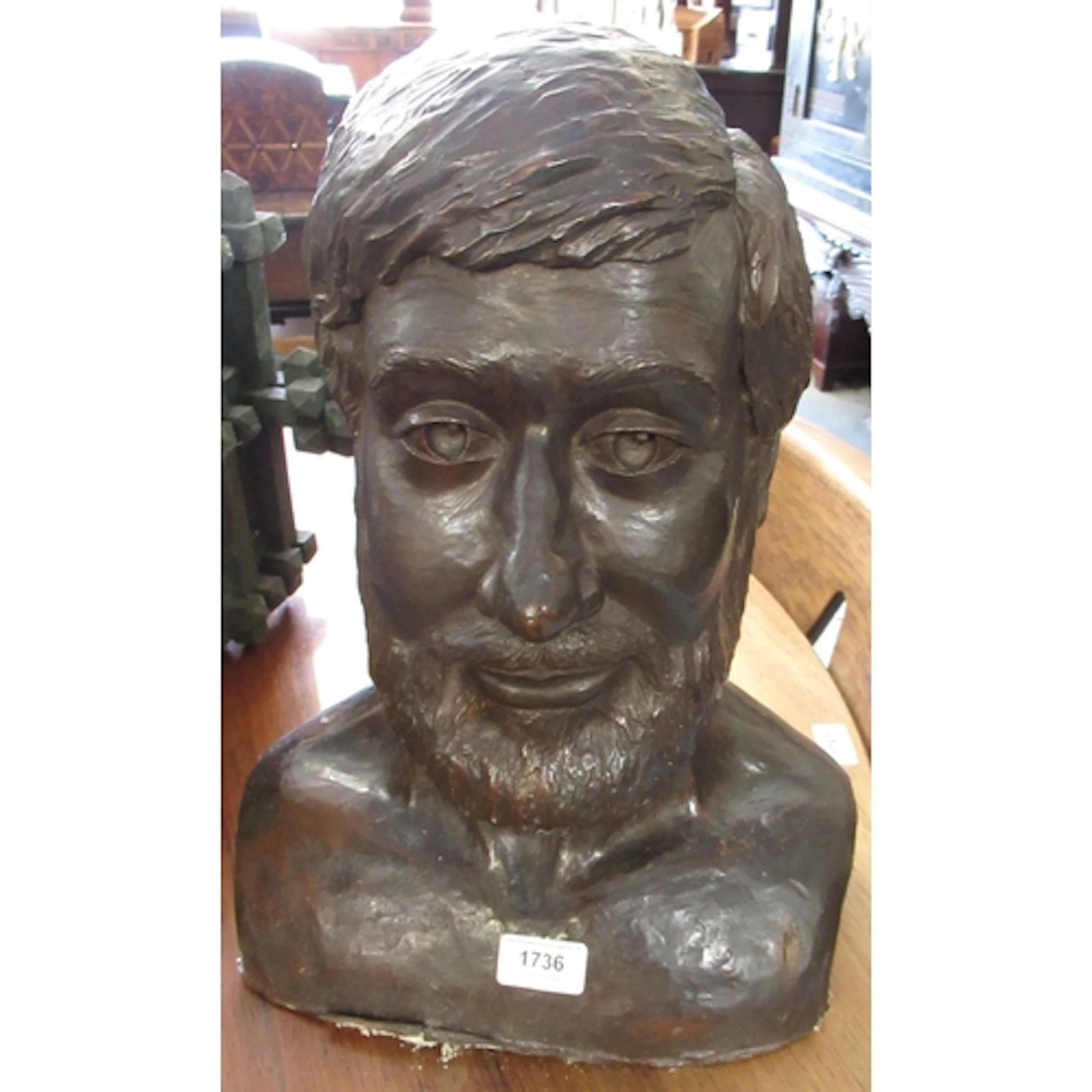 Brown patinated plaster bust of a bearded man