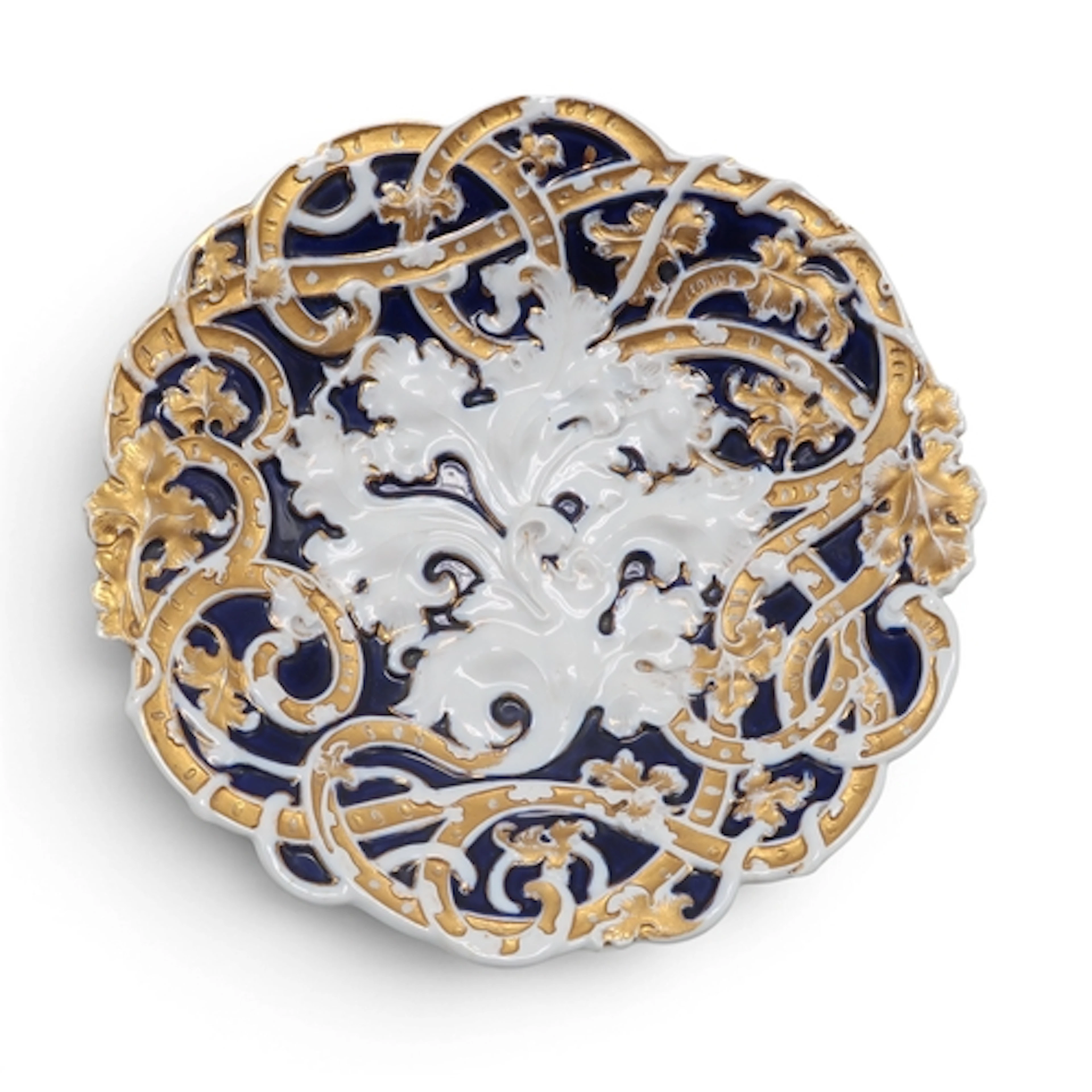 A Meissen moulded dish with scrolling acanthus leaves and st...