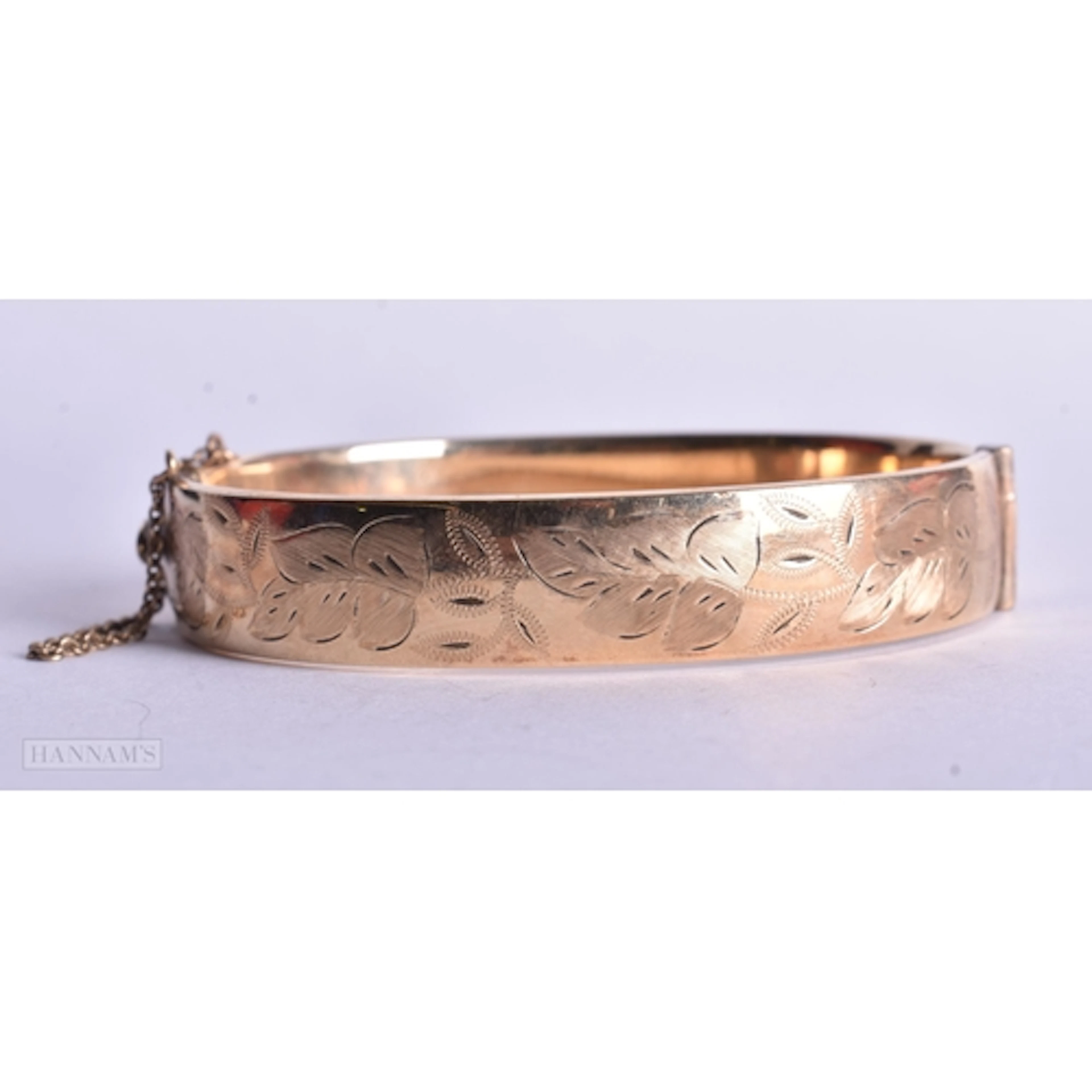 1/5th 9ct Rolled Gold Bangle w/ Metal Core (22g). 7 cm wide.
