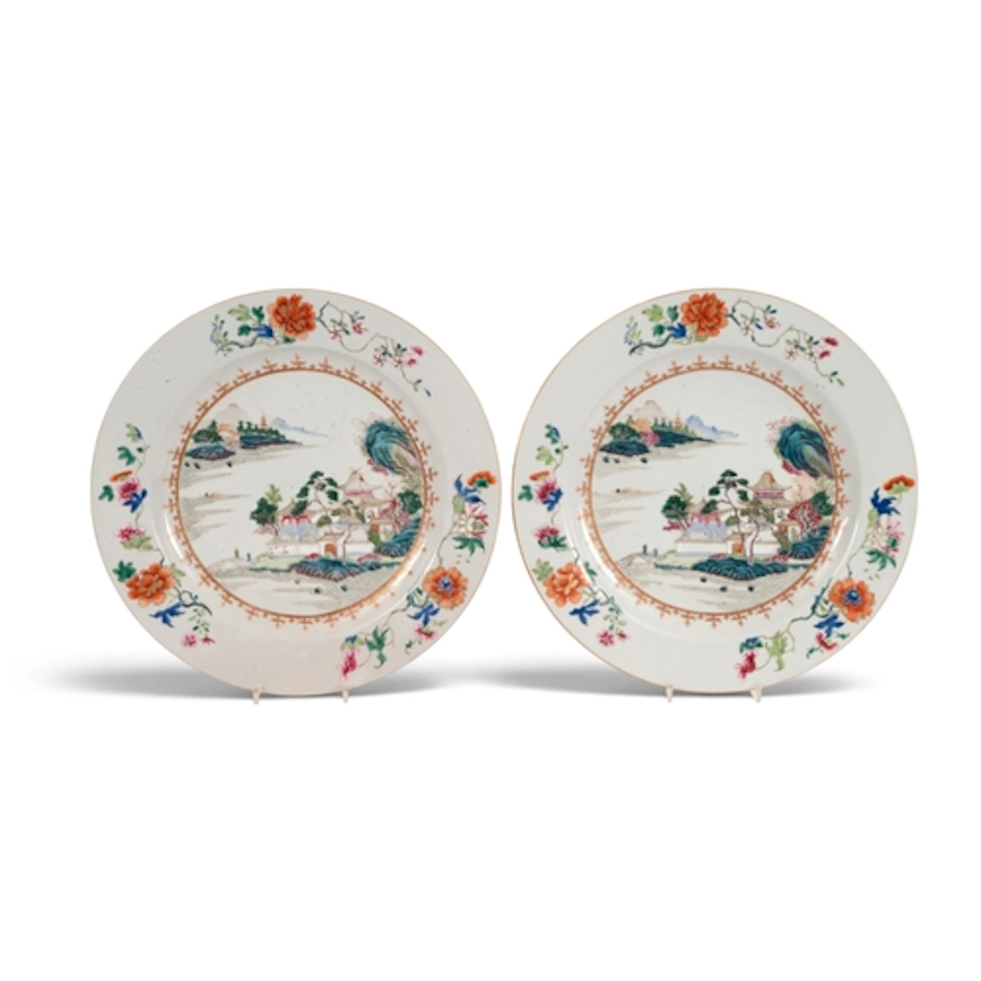 A pair of Chinese famille rose chargers, Qianlong 1736-95, p...