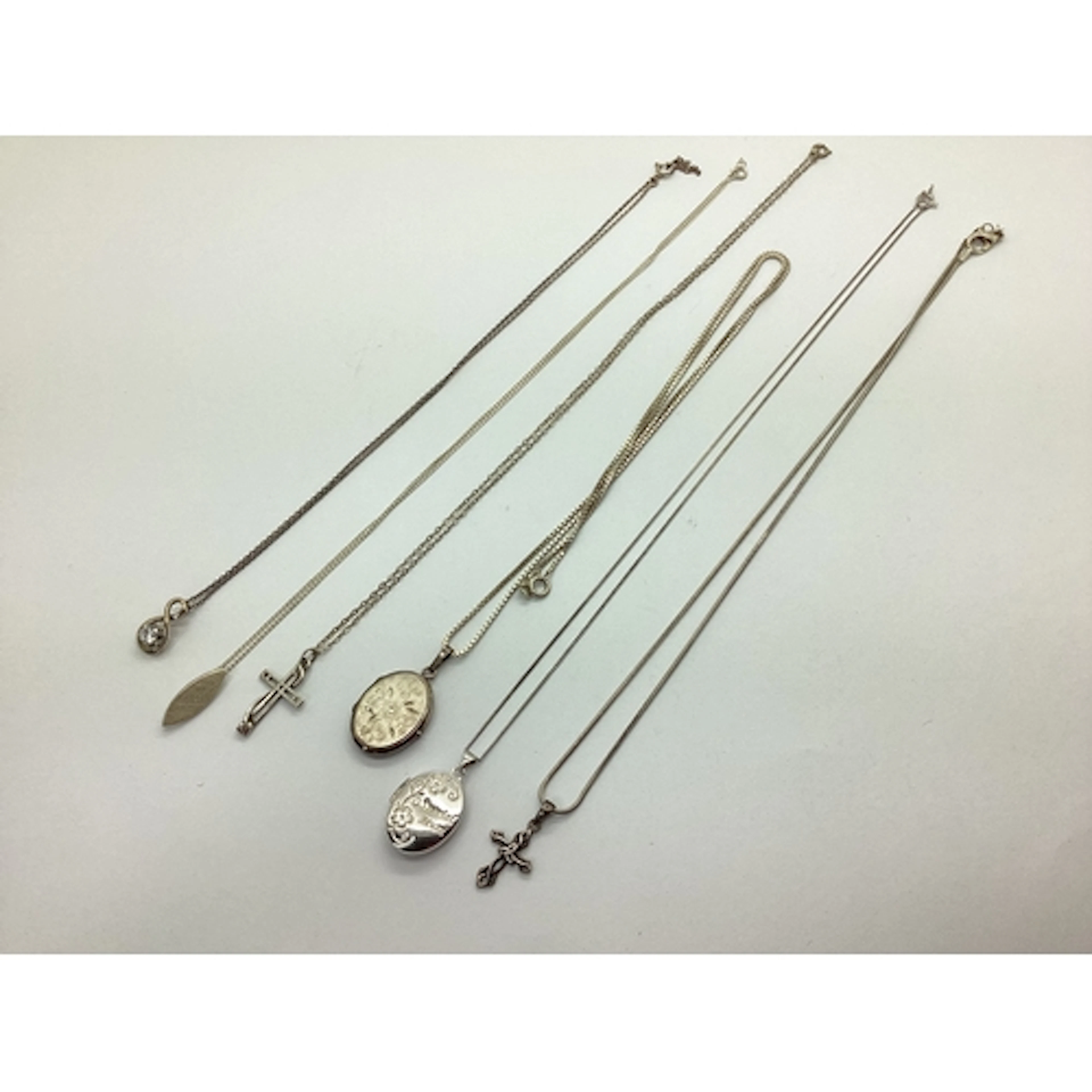 A Collection of "925" and Other Pendants and Chains, includi...