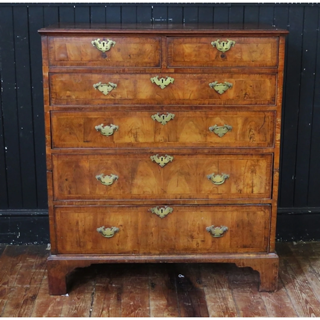 A 19th century mahogany and feather strung chest, containing...