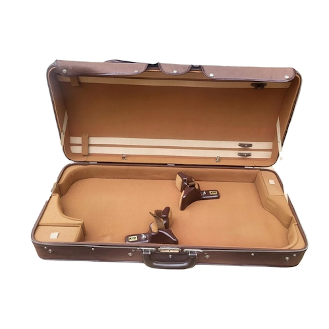 MEILE OF SWITZERLAND, A DOUBLE VIOLIN CASE With brown canvas...