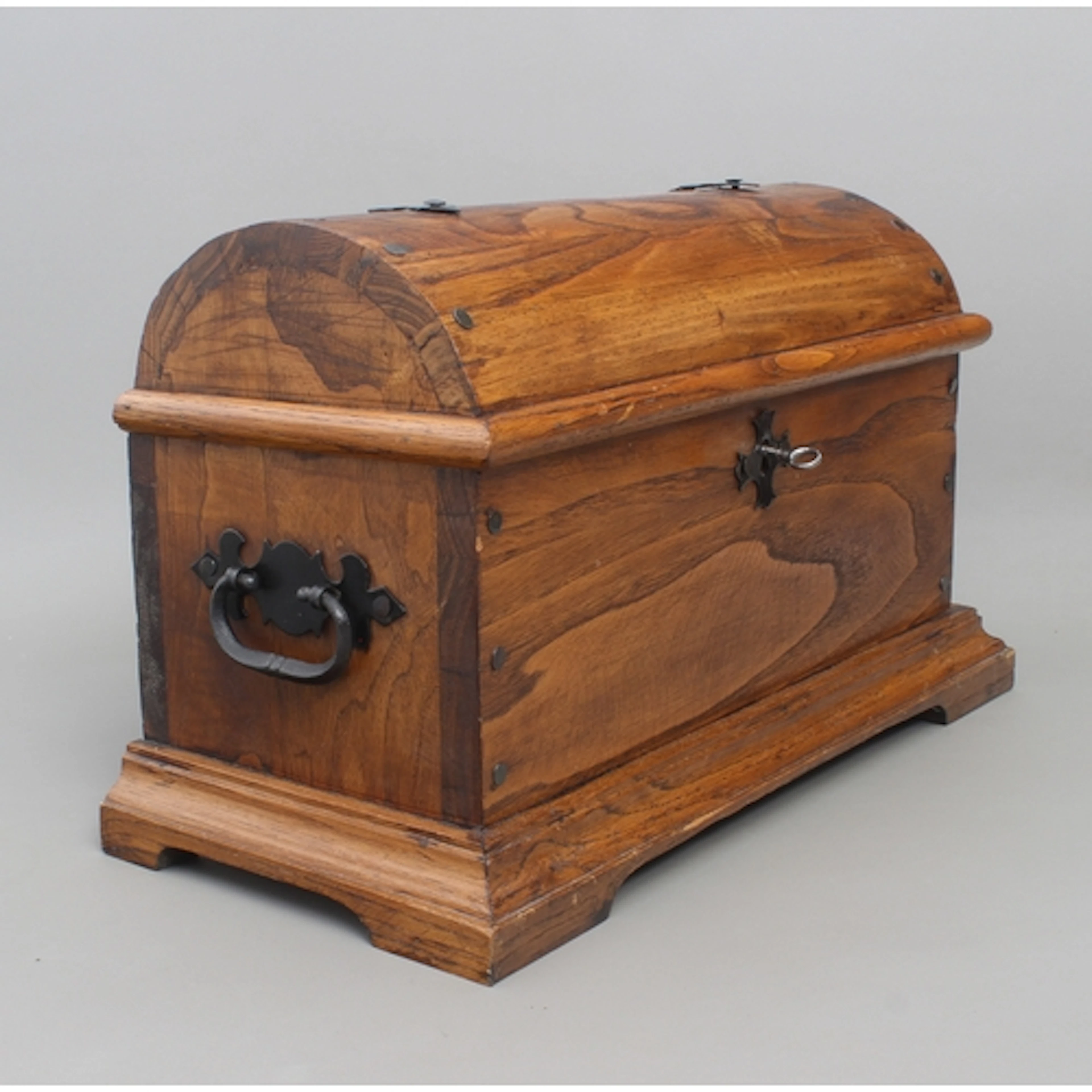 A contemporary hardwood miniature trunk - domed top with dec...
