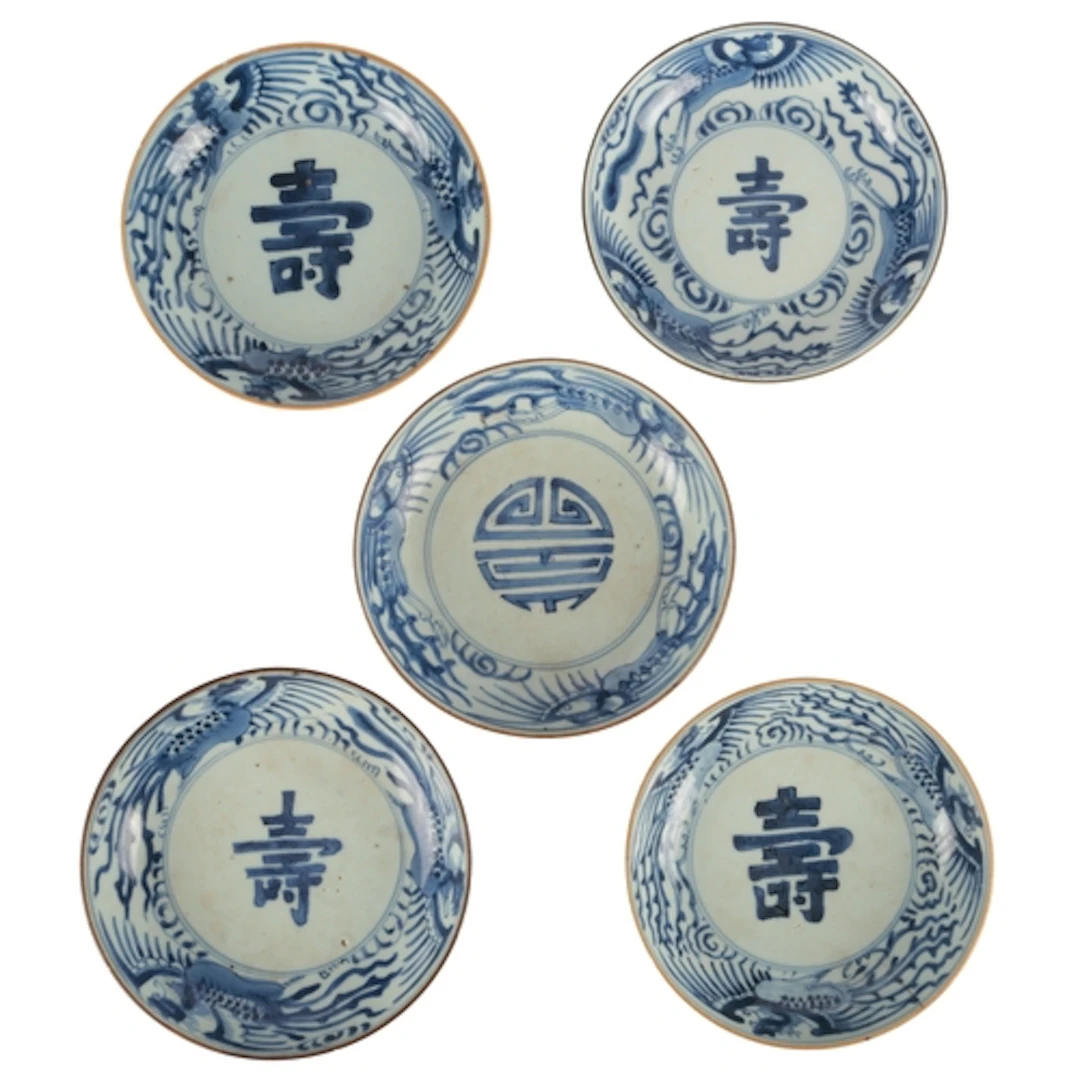 Five Chinese blue and white 'Shou' saucer dishes, Kangxi - Y...