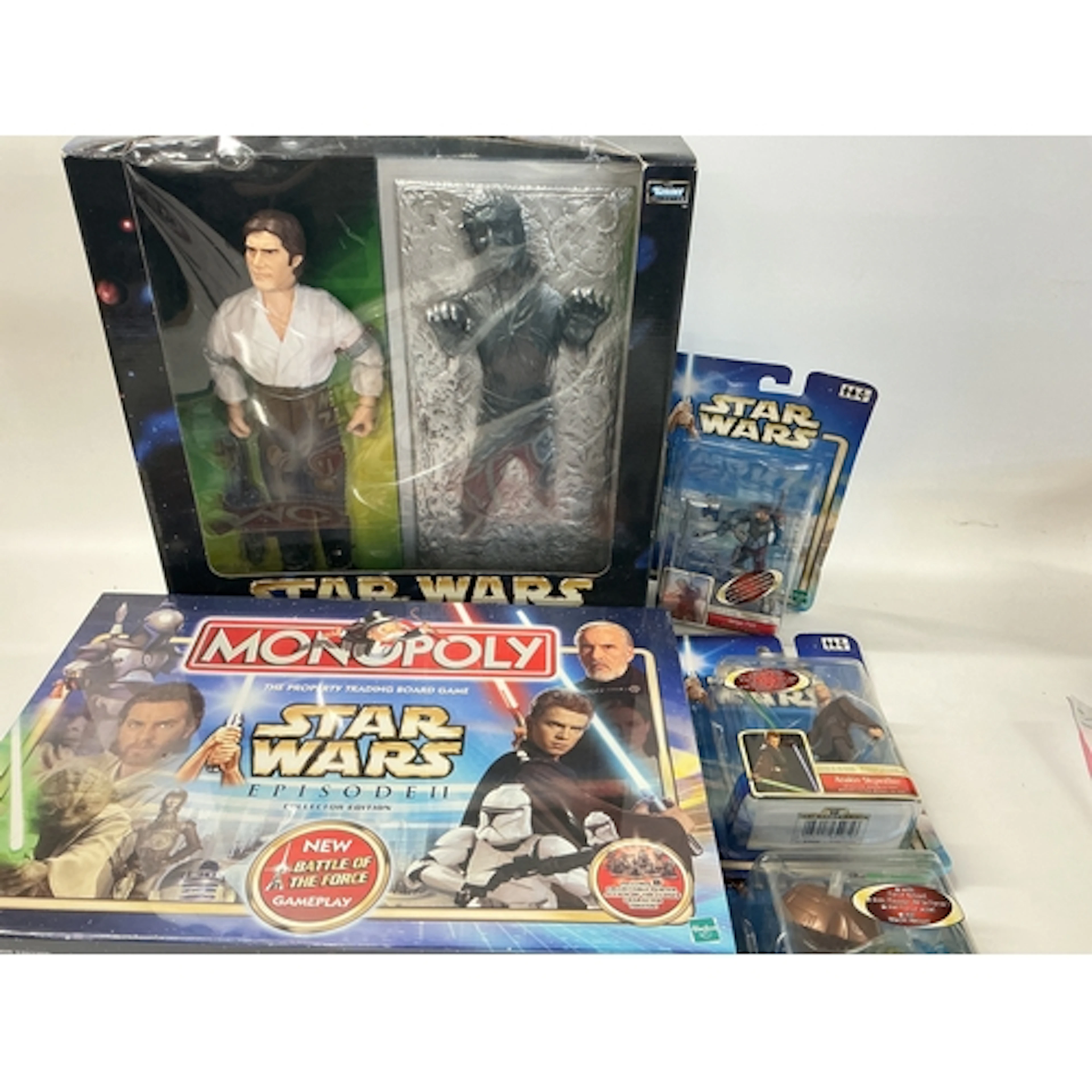 A Collection Of Boxed And Loose Modern Star Wars Toys. No Re...