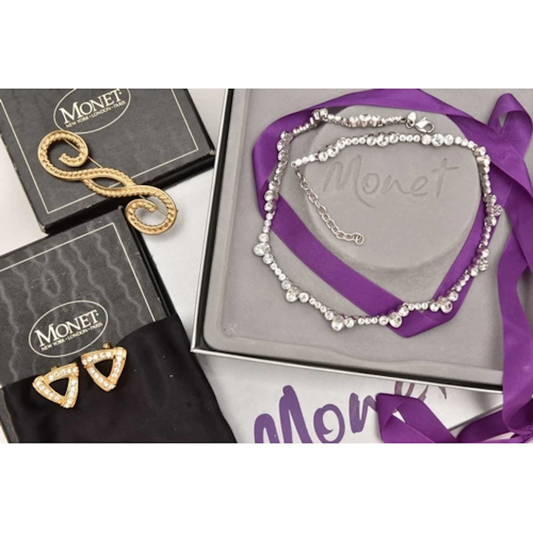 THREE ITEMS OF 'MONET' COSTUME JEWELLERY, to include a boxed...