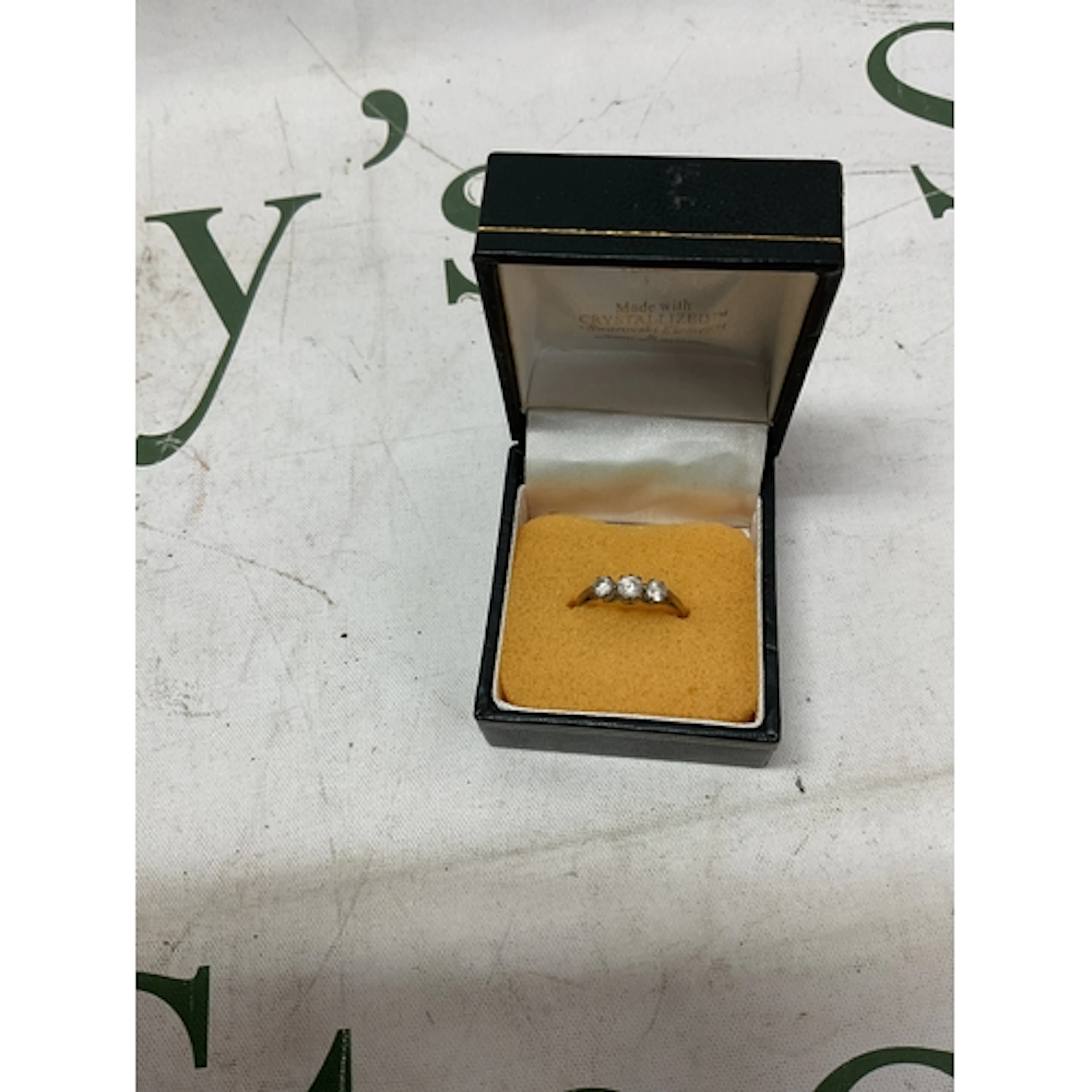 9ct CZ trilogy ring, weight 1.4 grams.