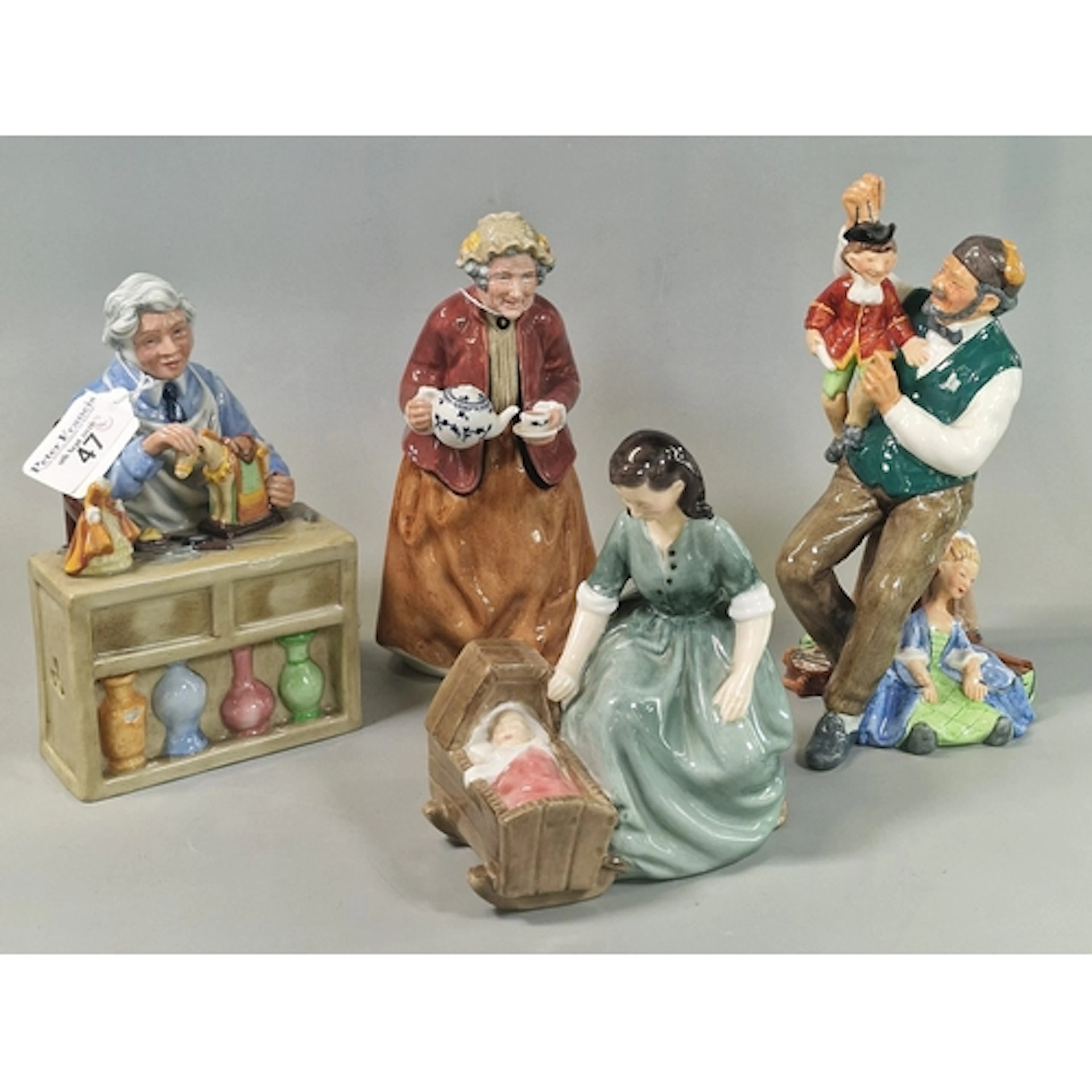 Four Royal Doulton bone china figurines to include: 'Cradle ...