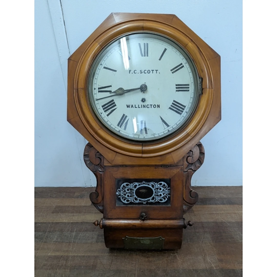 A circa 1900 8-day wall hanging drop dial clock, the dial si...