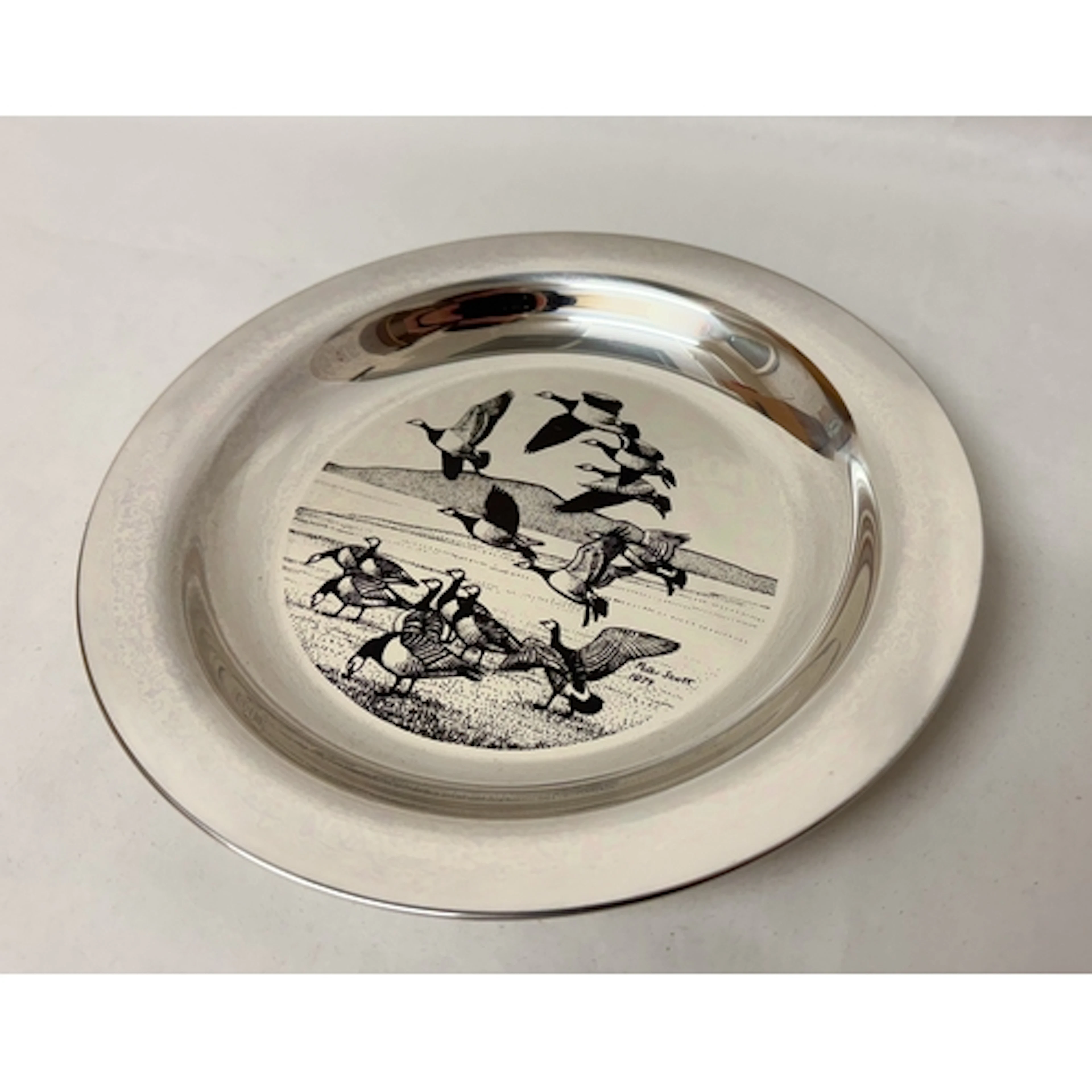 A silver 1974 Peter Scott Christmas plate by John Pinches, f...
