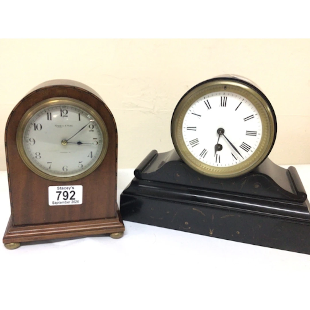 A Mappin & Webb mahogany cased Mantel clock and a black ...