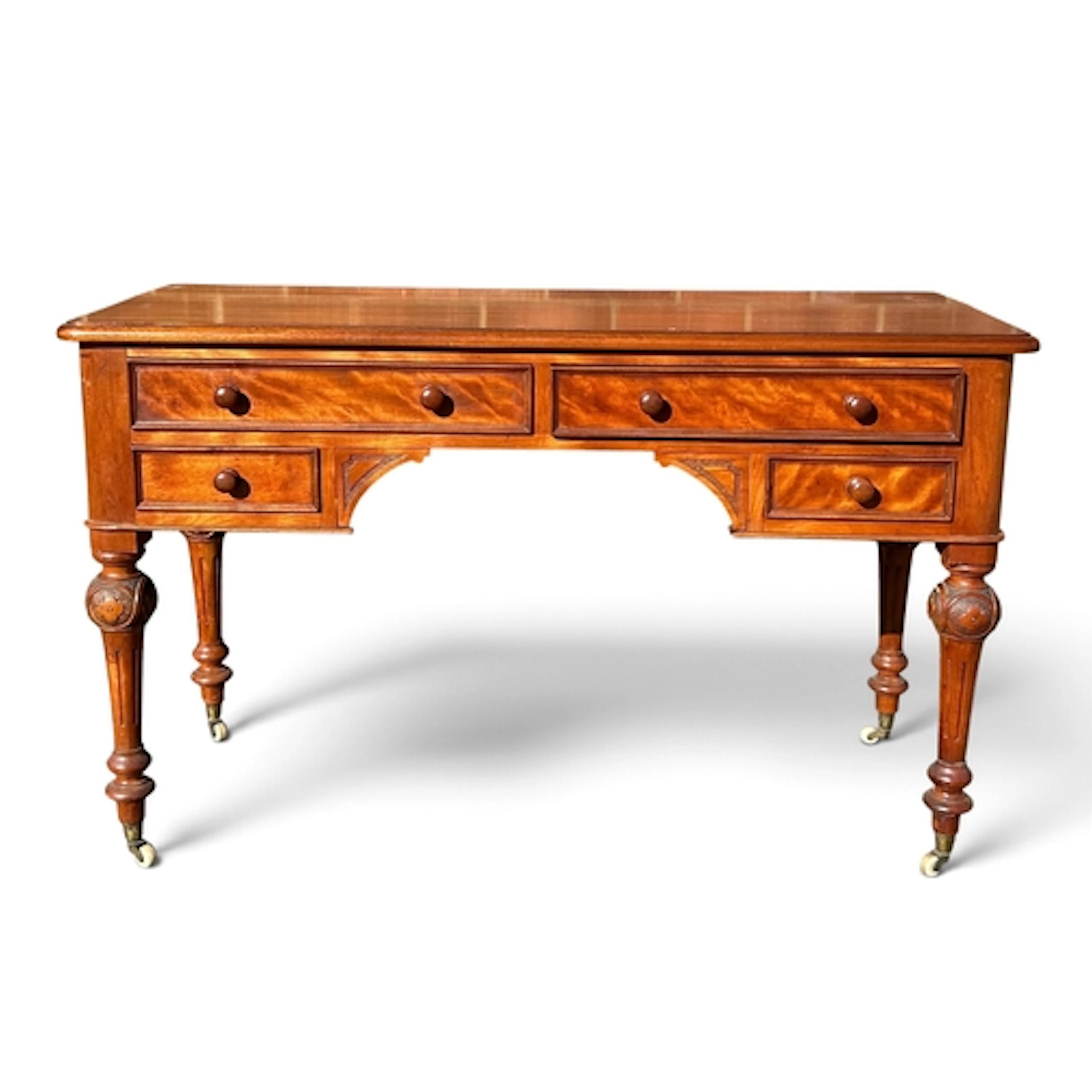 A VICTORIAN SATINWOOD DESK, FITTED WITH FOUR DRAWERS With ar...