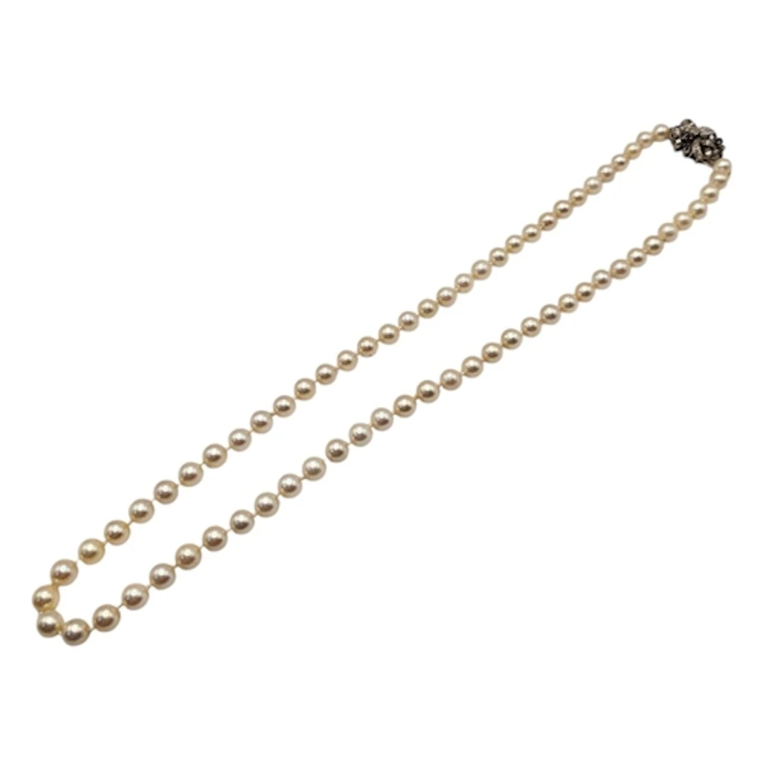 A VINTAGE 14CT GOLD, SAPPHIRE AND DIAMOND PEARL NECKLACE Hav...