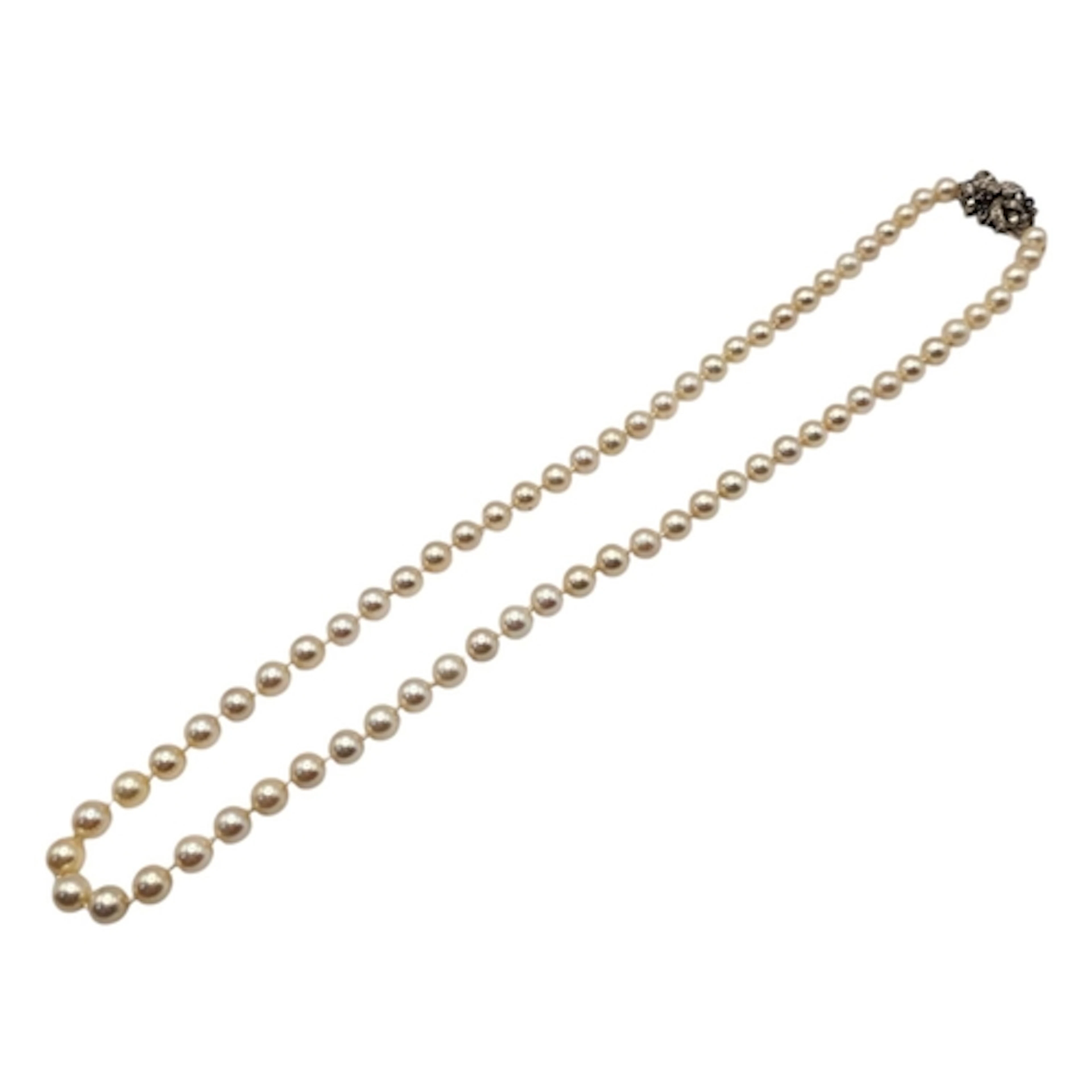 A VINTAGE 14CT GOLD, SAPPHIRE AND DIAMOND PEARL NECKLACE Hav...