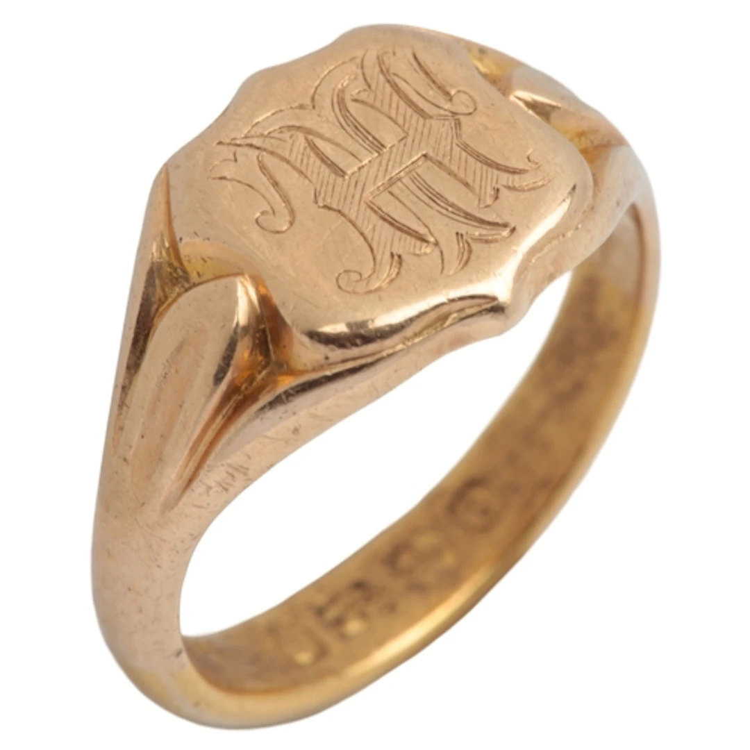 A gold signet ring, late 19th/early 20th century, centring o...