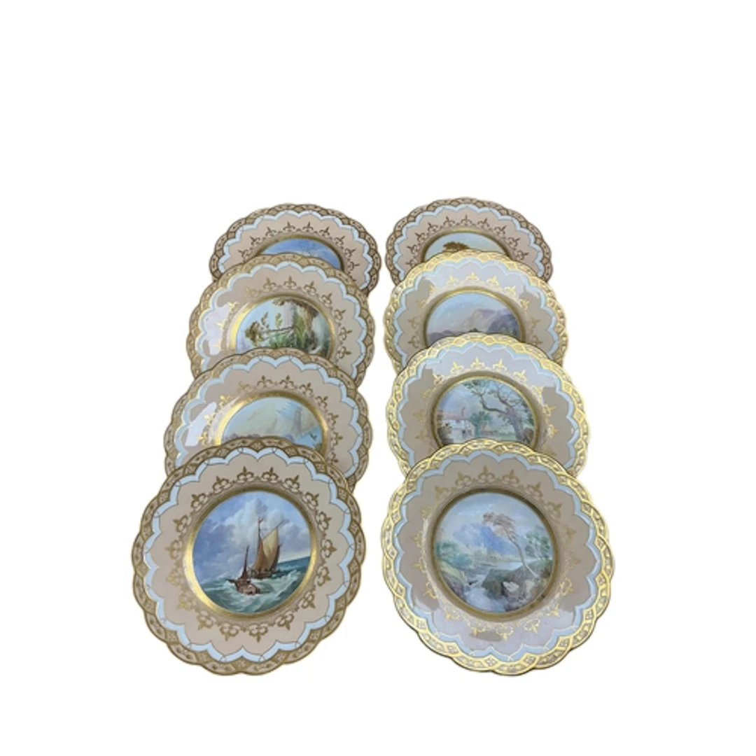 A set of eight Victorian porcelain topographical plates, one...