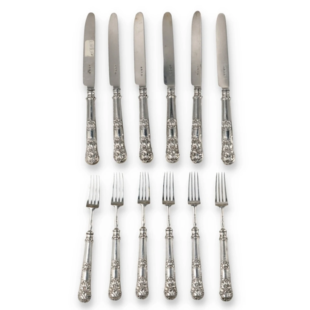 A SET OF SIX PAIRS OF GEORGE IV SILVER DESSERT KNIVES AND FO...