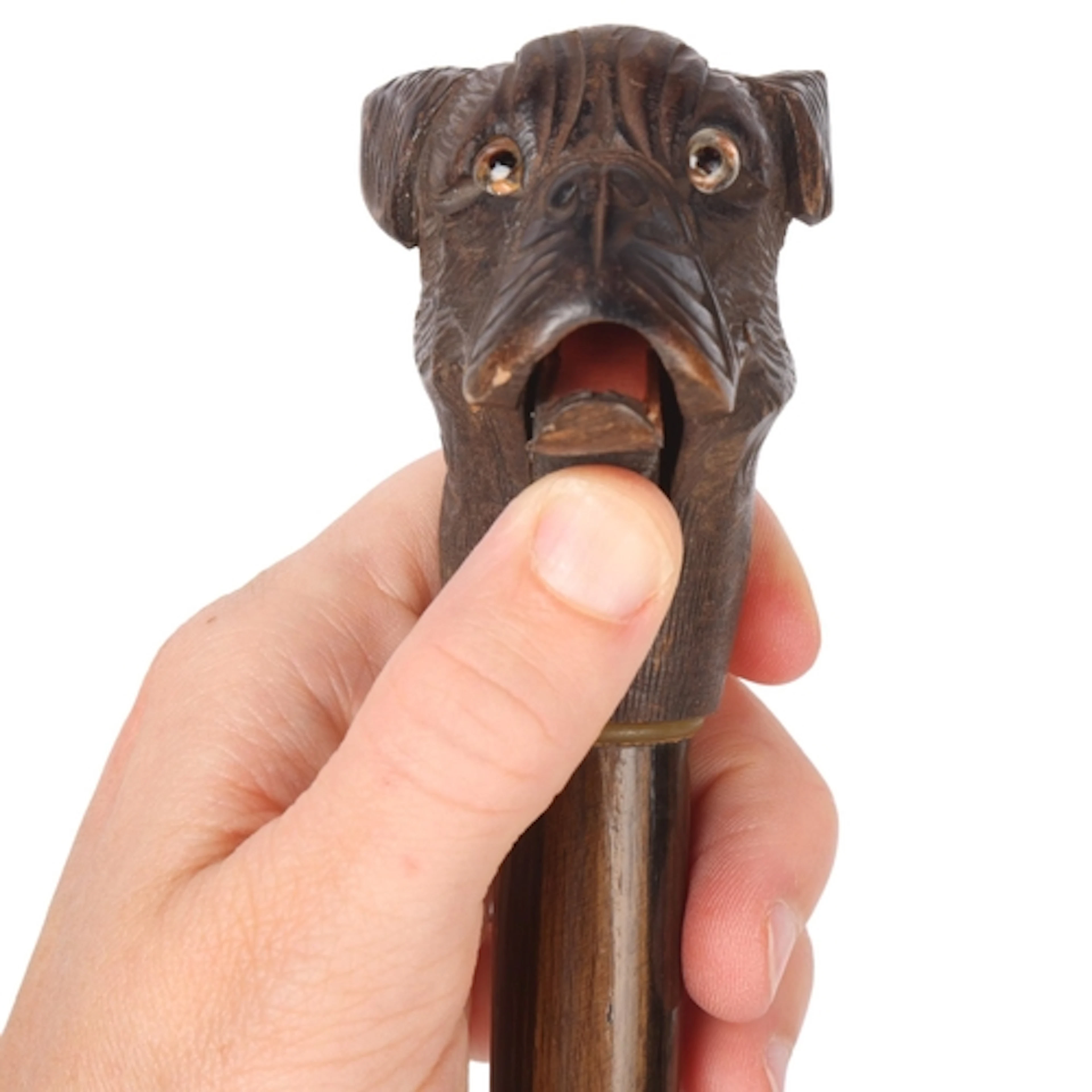 An antique automaton glove-holder cane handle, the carved bo...