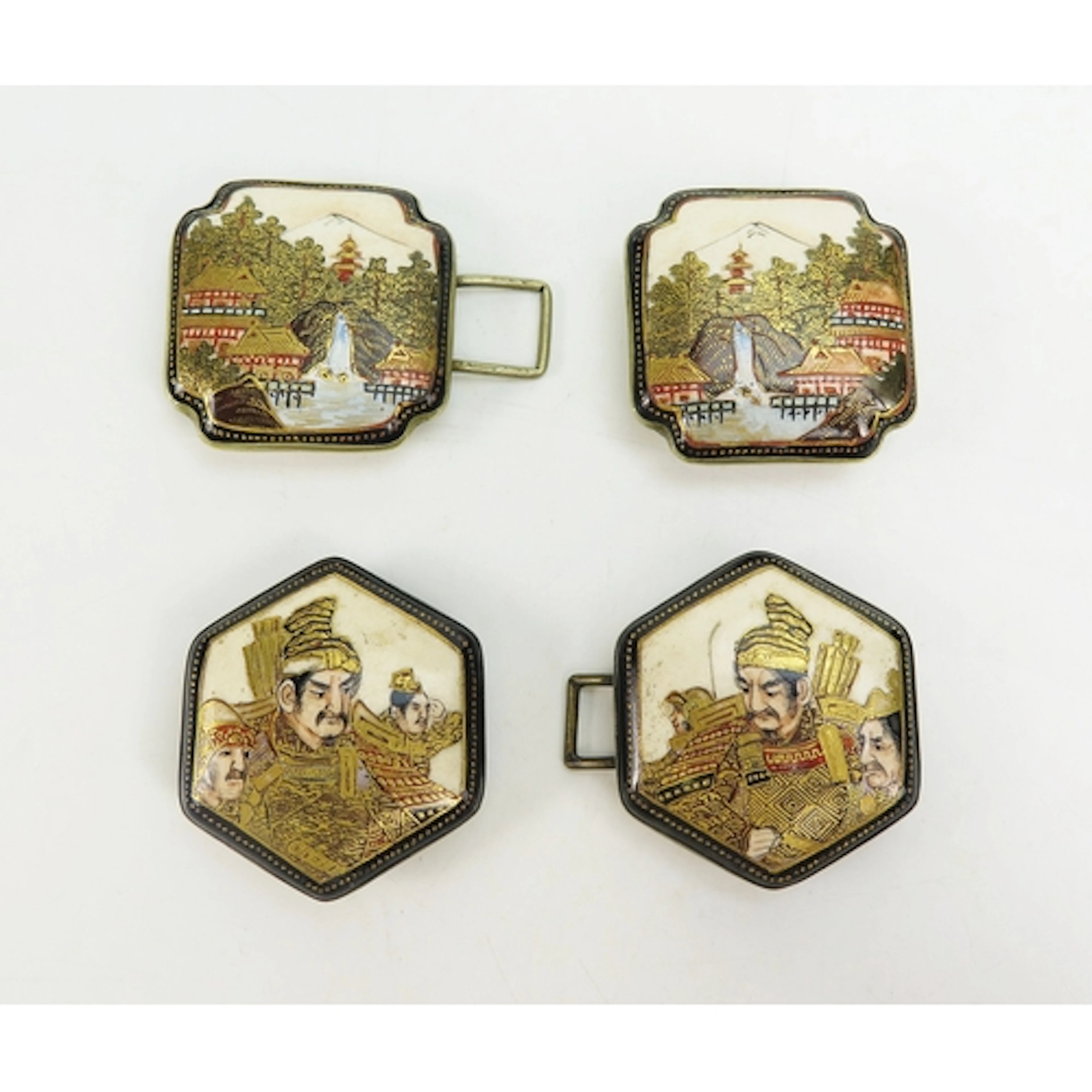 Two Japanese Meiji period Satsuma belt buckles, each in two ...