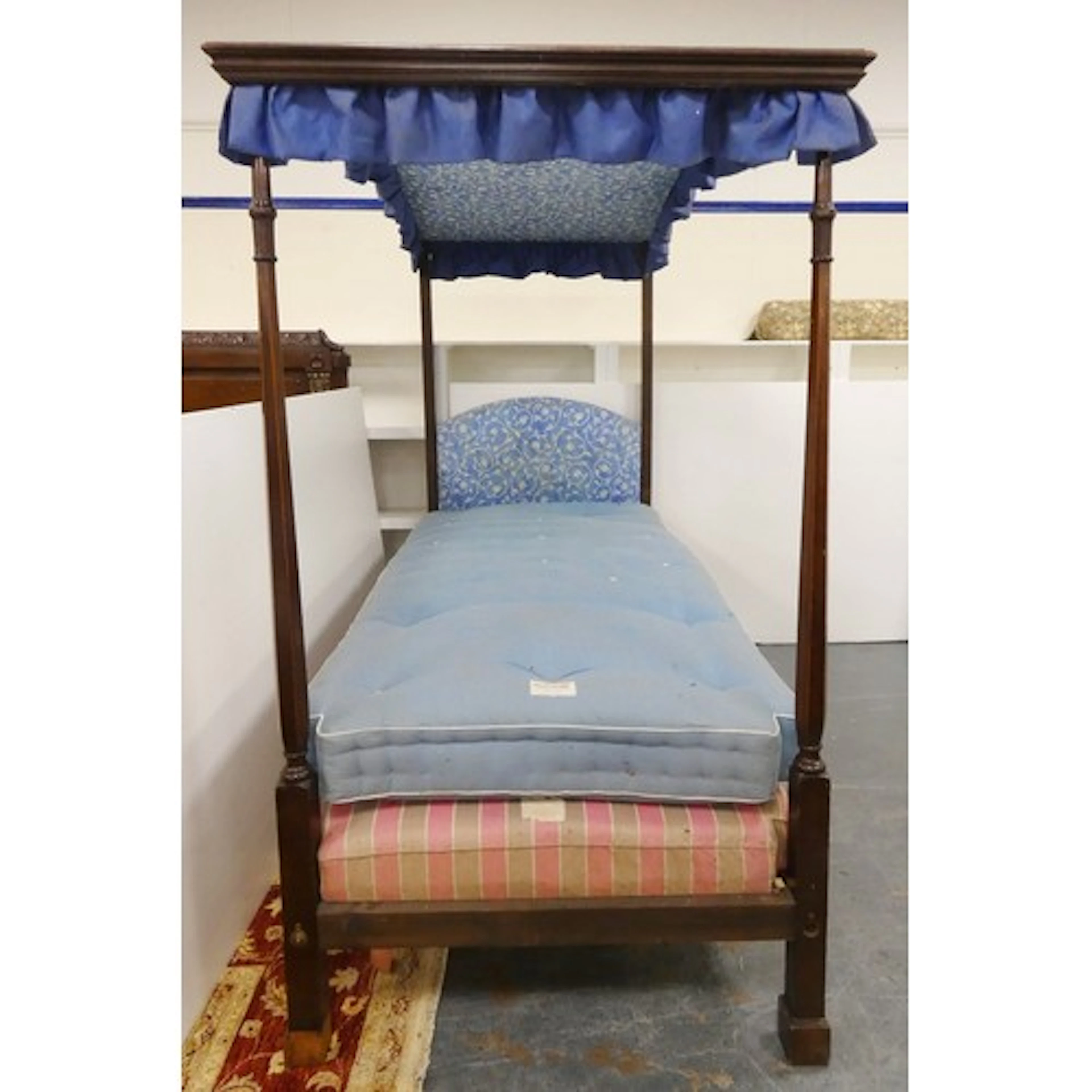 Vintage mahogany single four-poster bed with arch-top canopy...