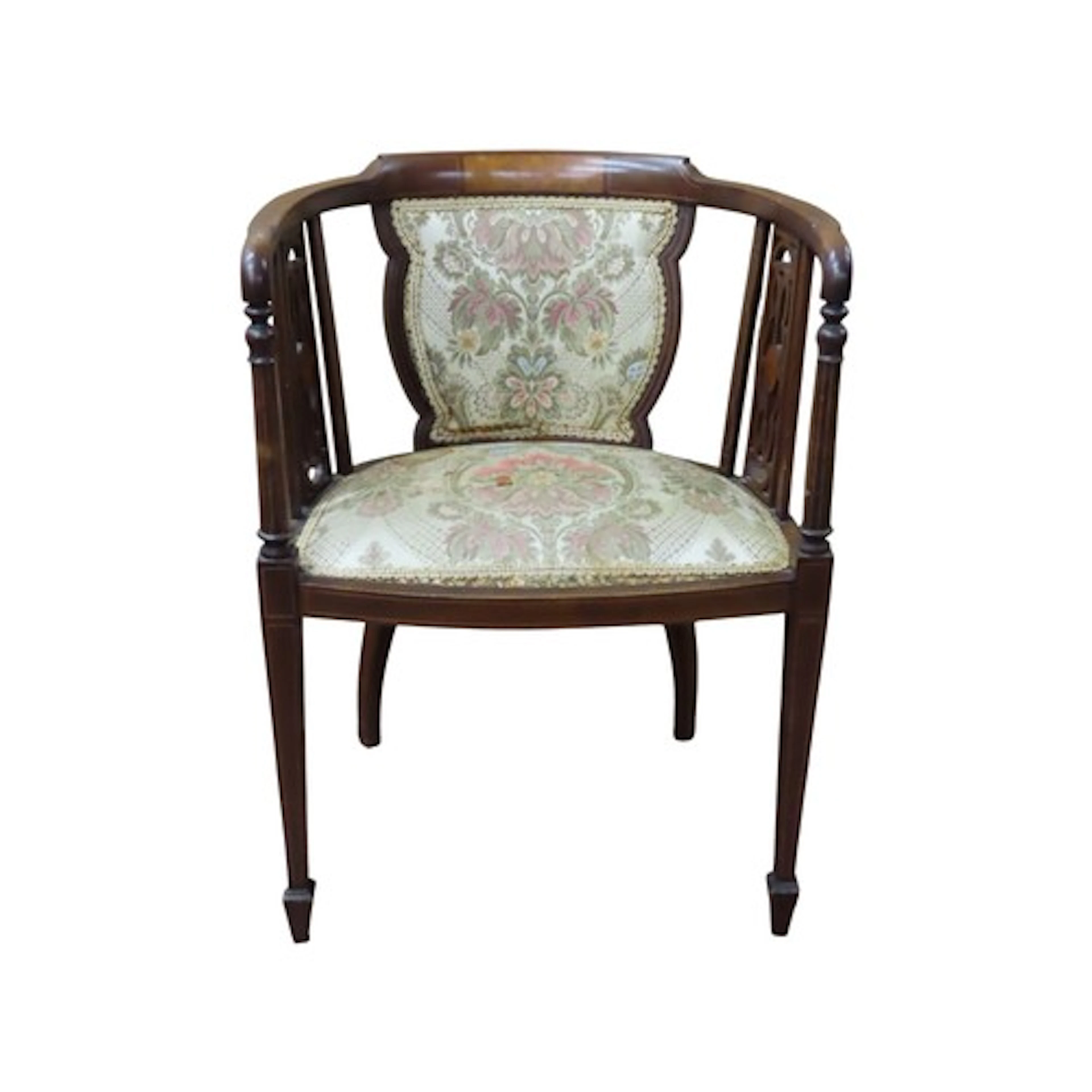 An inlaid Edwardian mahogany tub chair on square tapered leg...