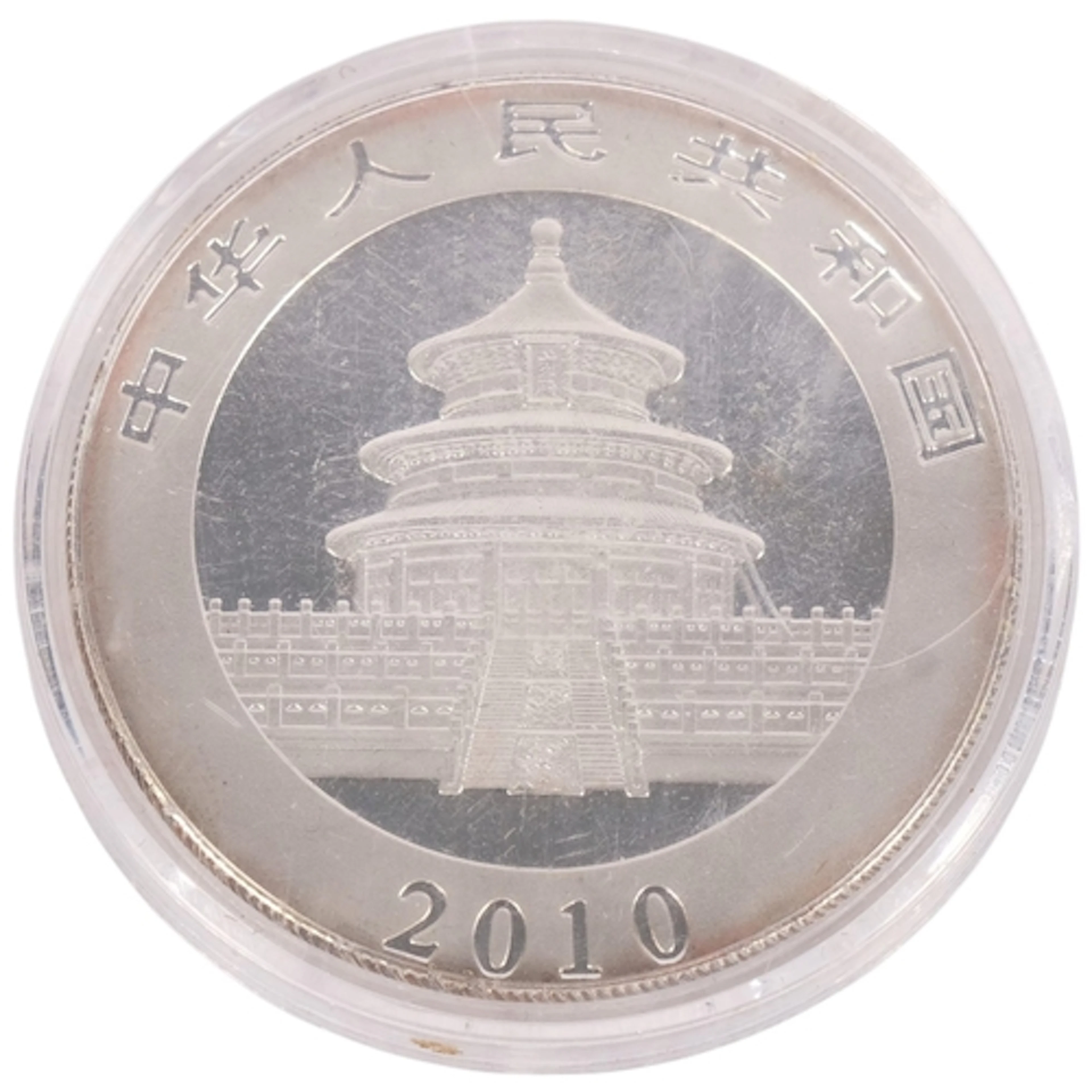 A 2010 Chinese 1oz 999 silver 10 yuan panda coin, in protect...