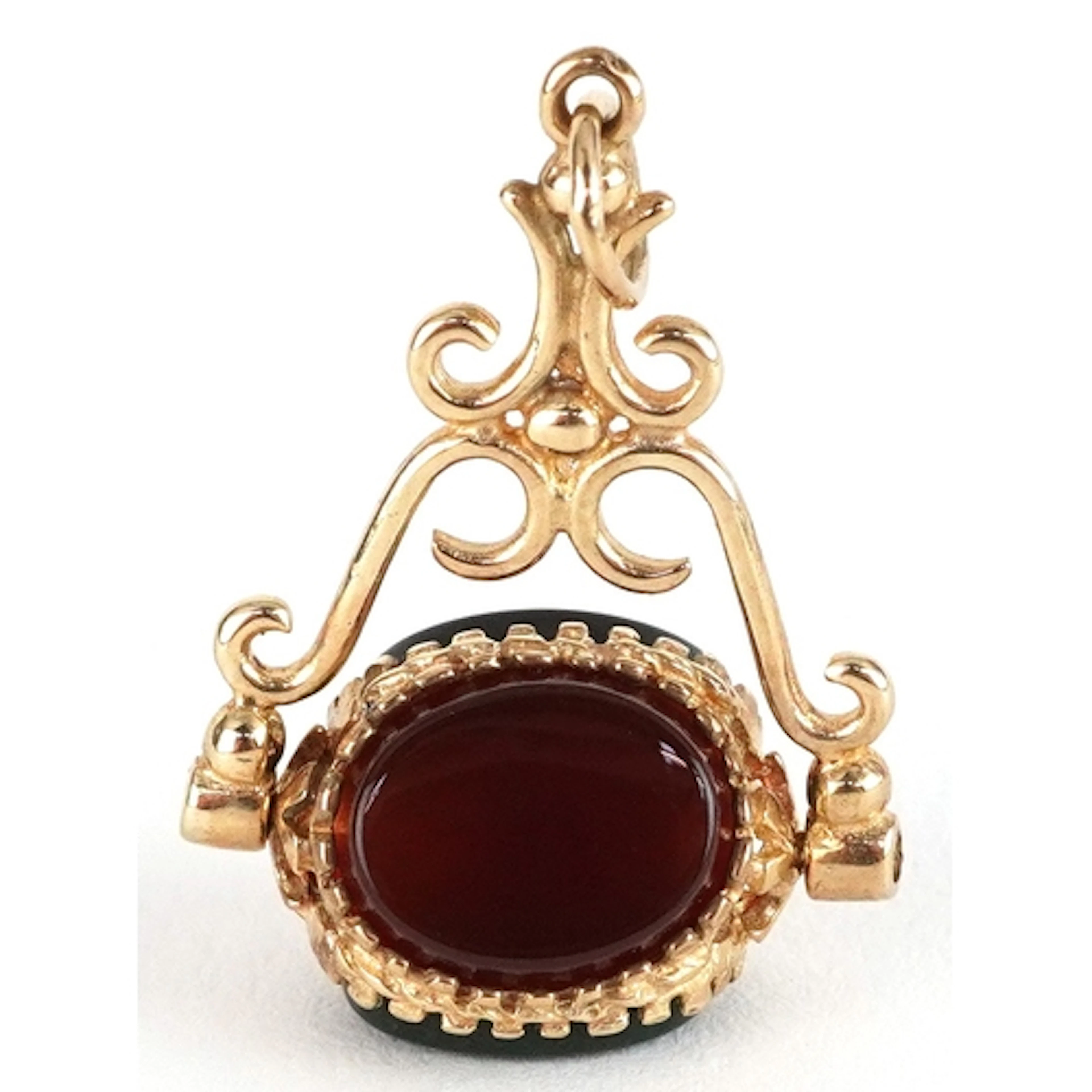 9ct gold hardstone spinner fob, 3cm high, 2.9g.