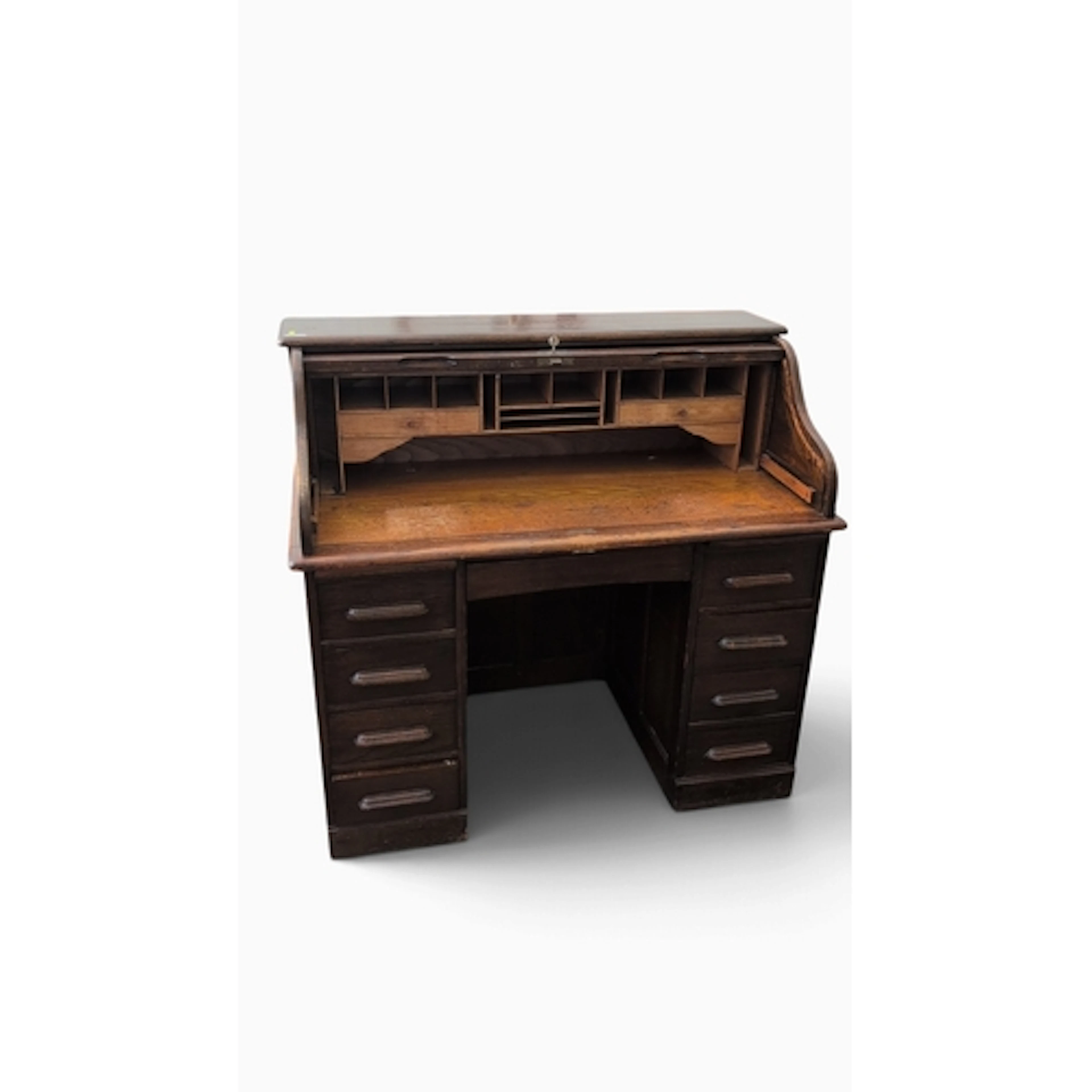 Early 20th-century oak roll-top pedestal desk, the tambour e...