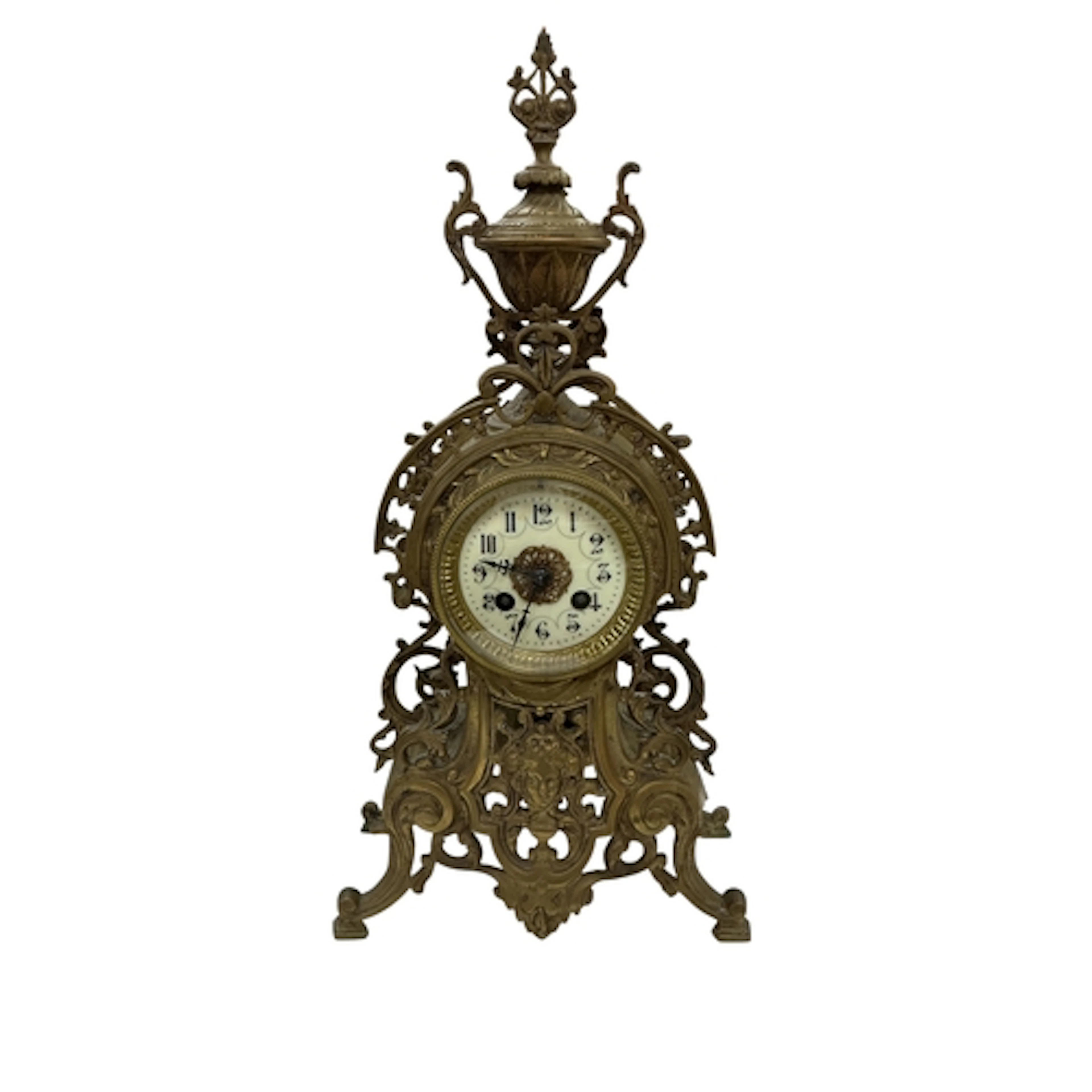 A French gilt-metal mantel clock, with pierced foliate desig...