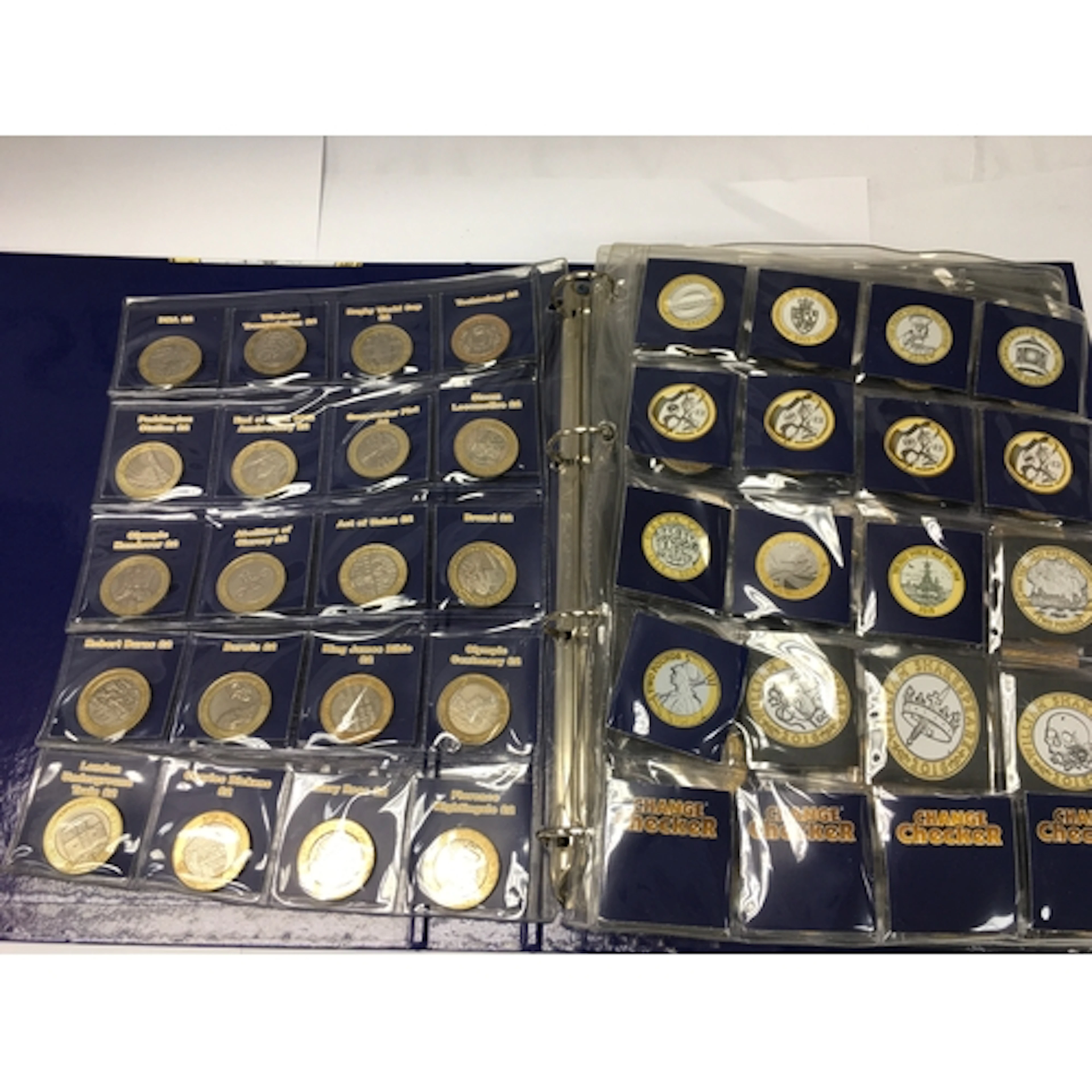 A change checker album containing various commemorative &pou...