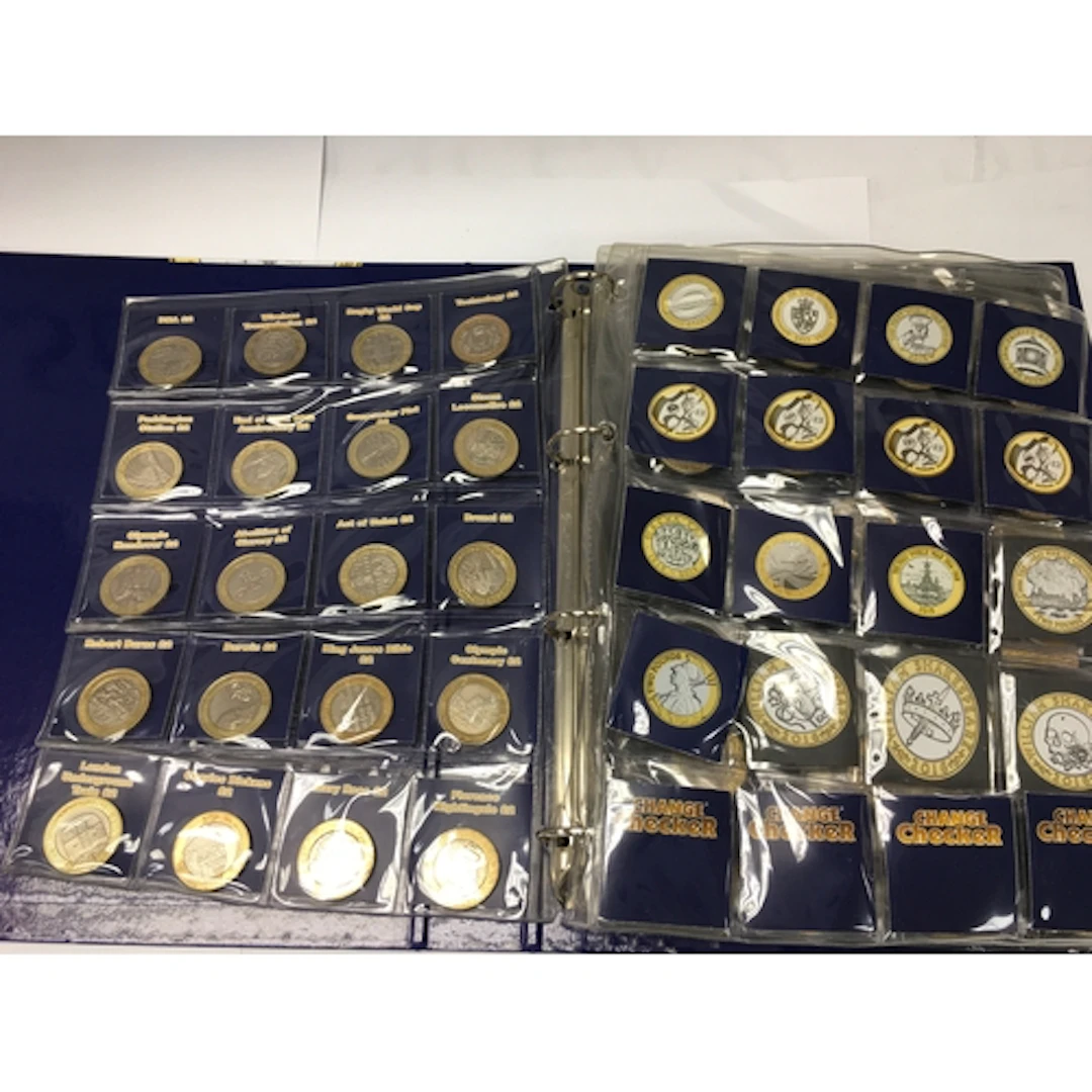 A change checker album containing various commemorative &pou...