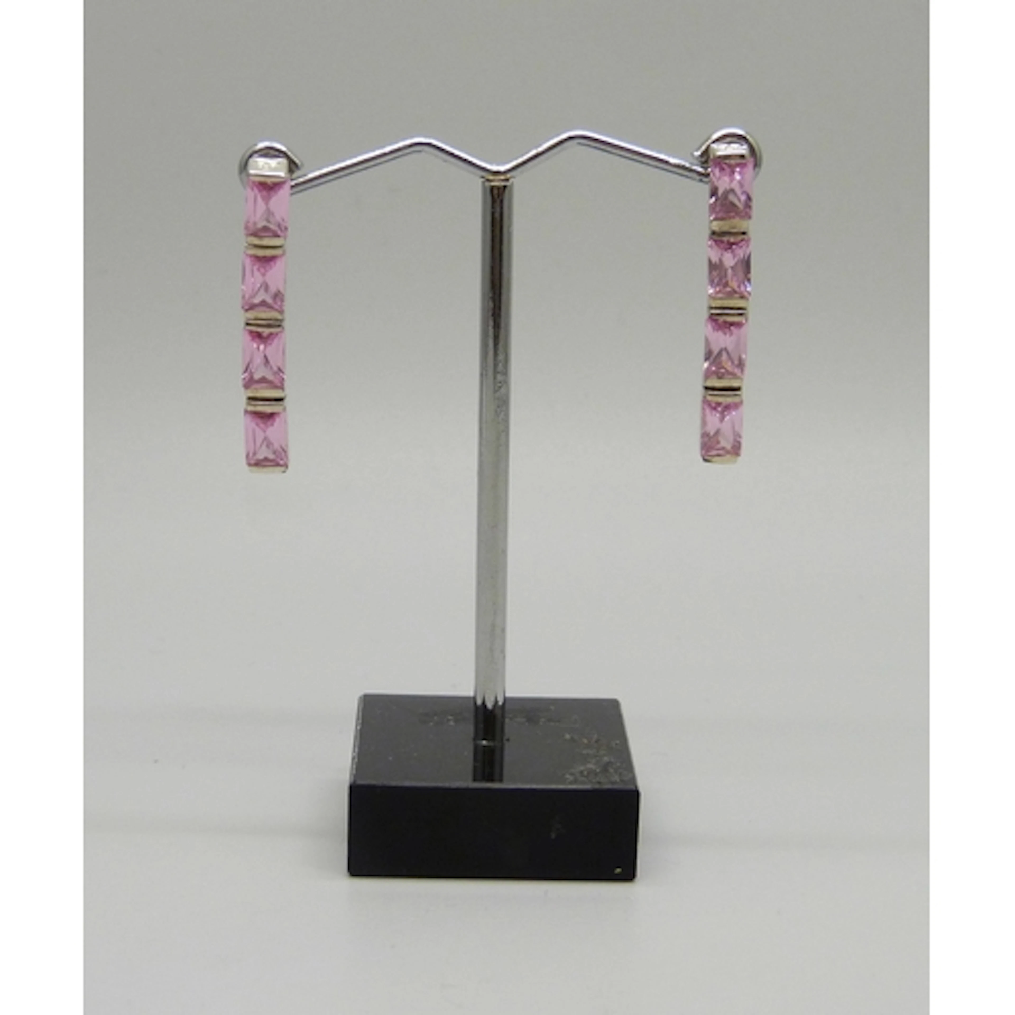 A pair of silver and pink cubic zirconia drop earrings, 3cm