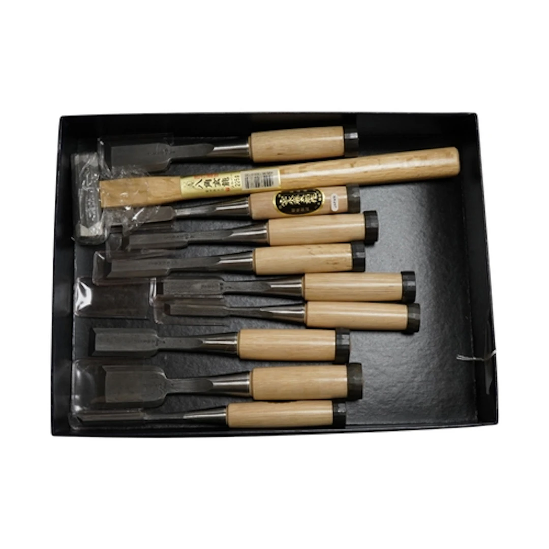 A set of nine Japanese bevel edge chisels and mortise chisel...
