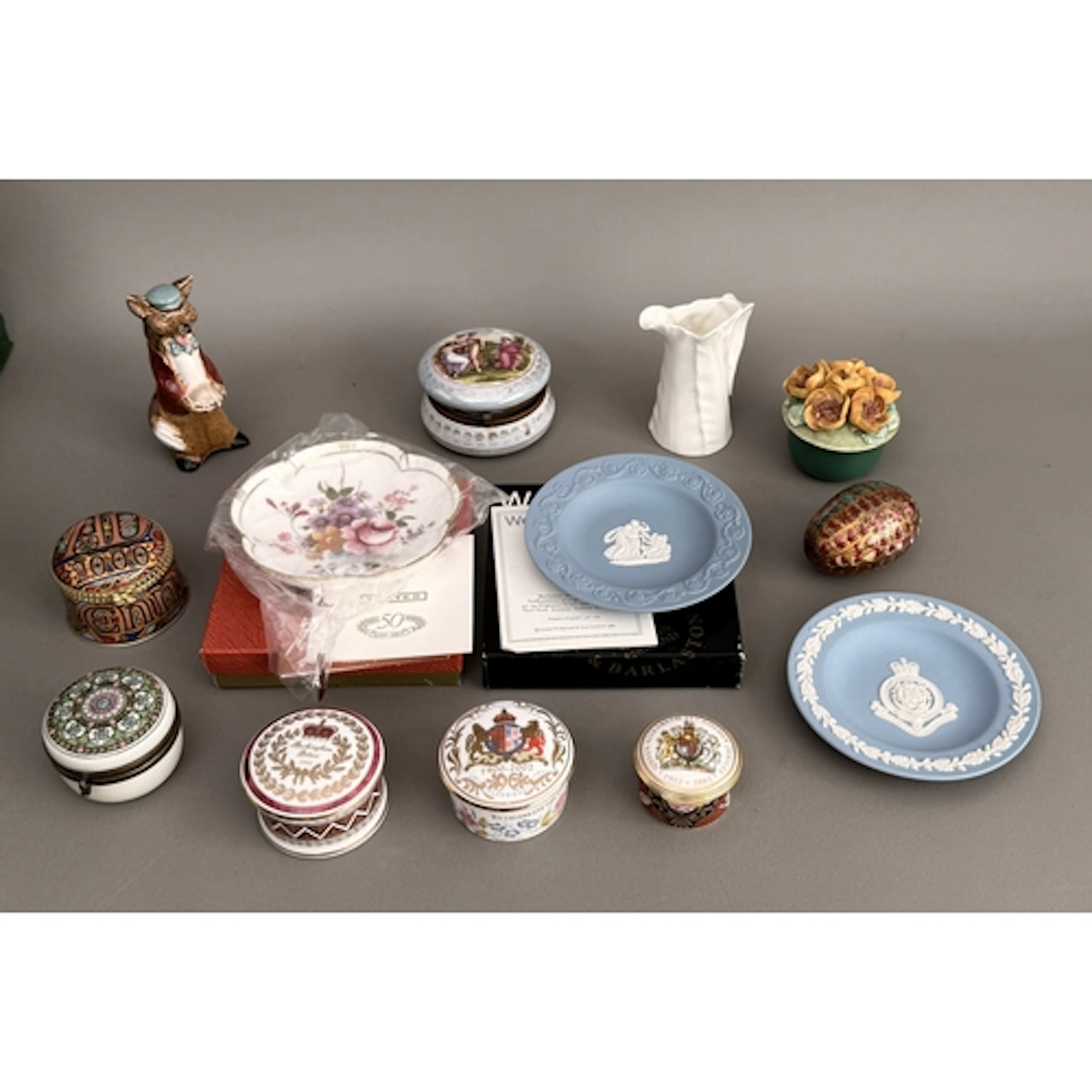 A collection of porcelain trinket boxes - to include an earl...