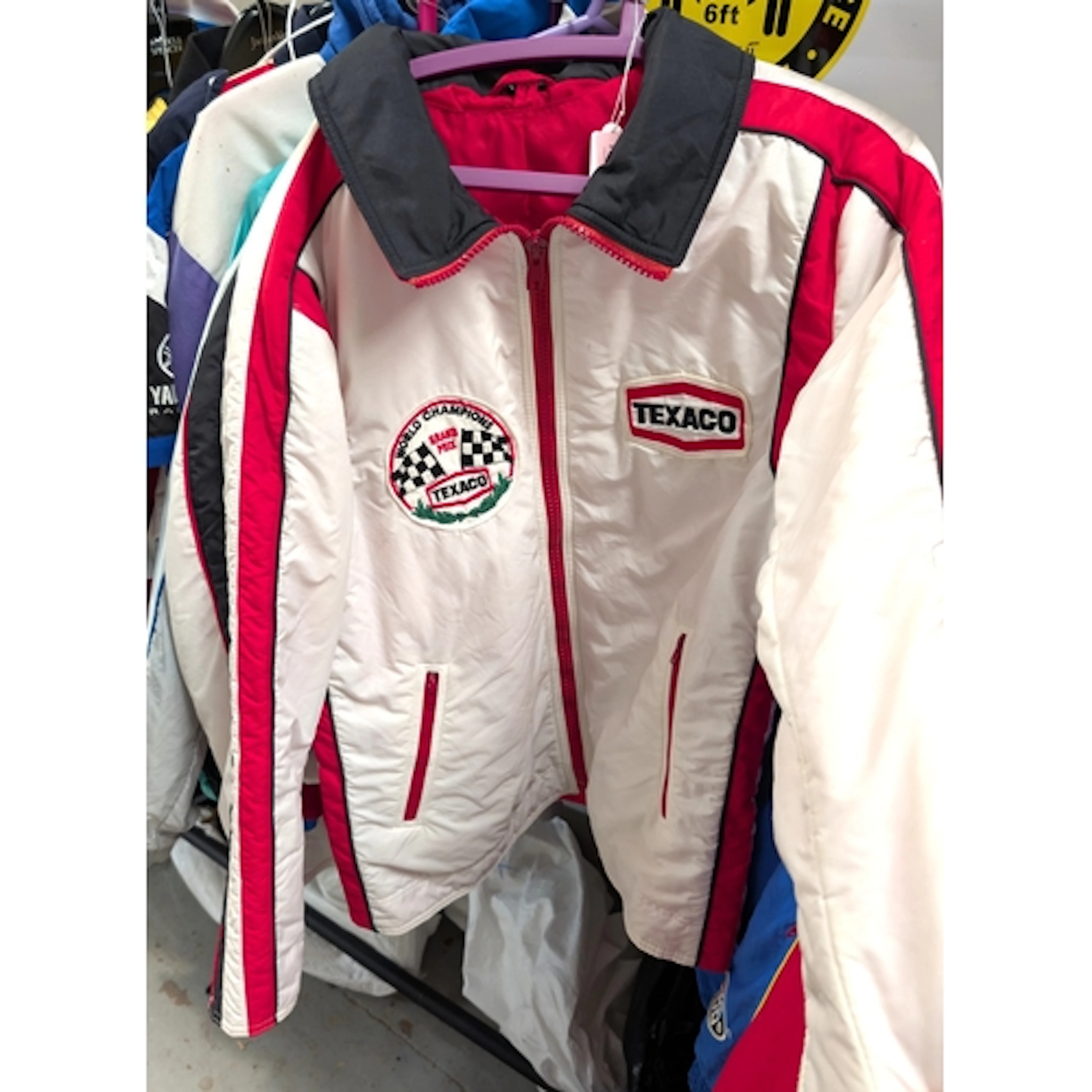 A vintage Texaco racing jacket and three others