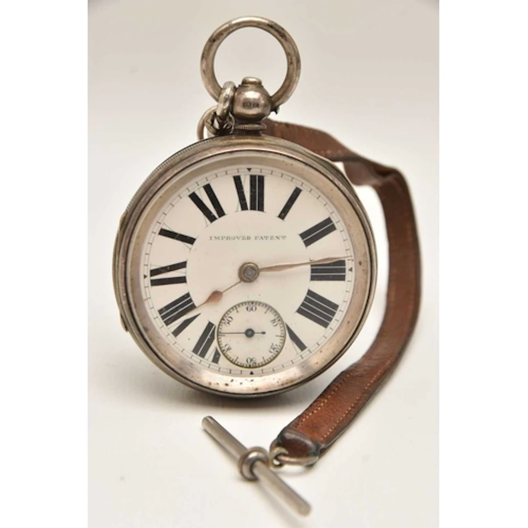 A LATE VICTORIAN SILVER OPEN FACE POCKET WATCH WITH LEATHER ...