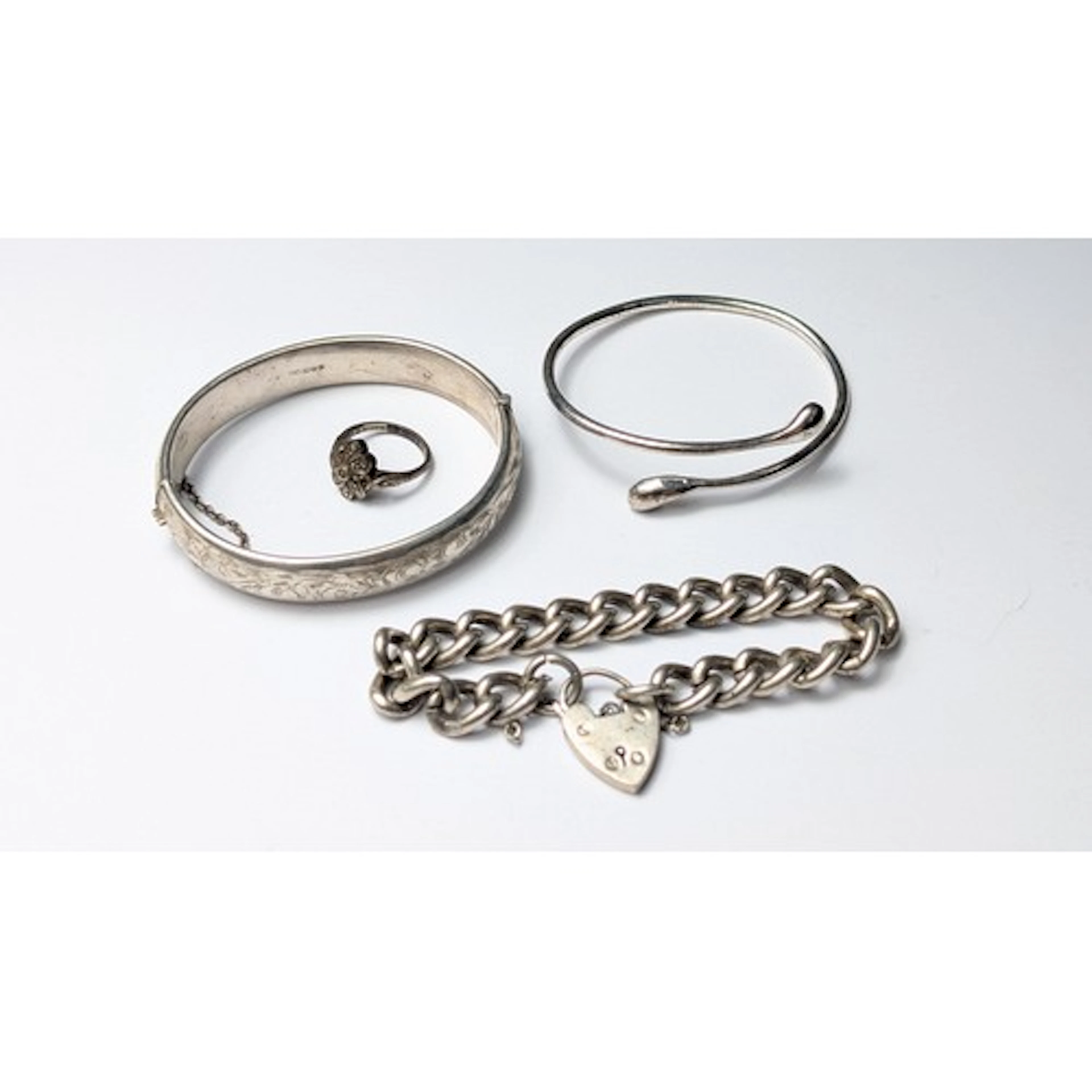 Three various silver bracelets, including a Charles Horner h...