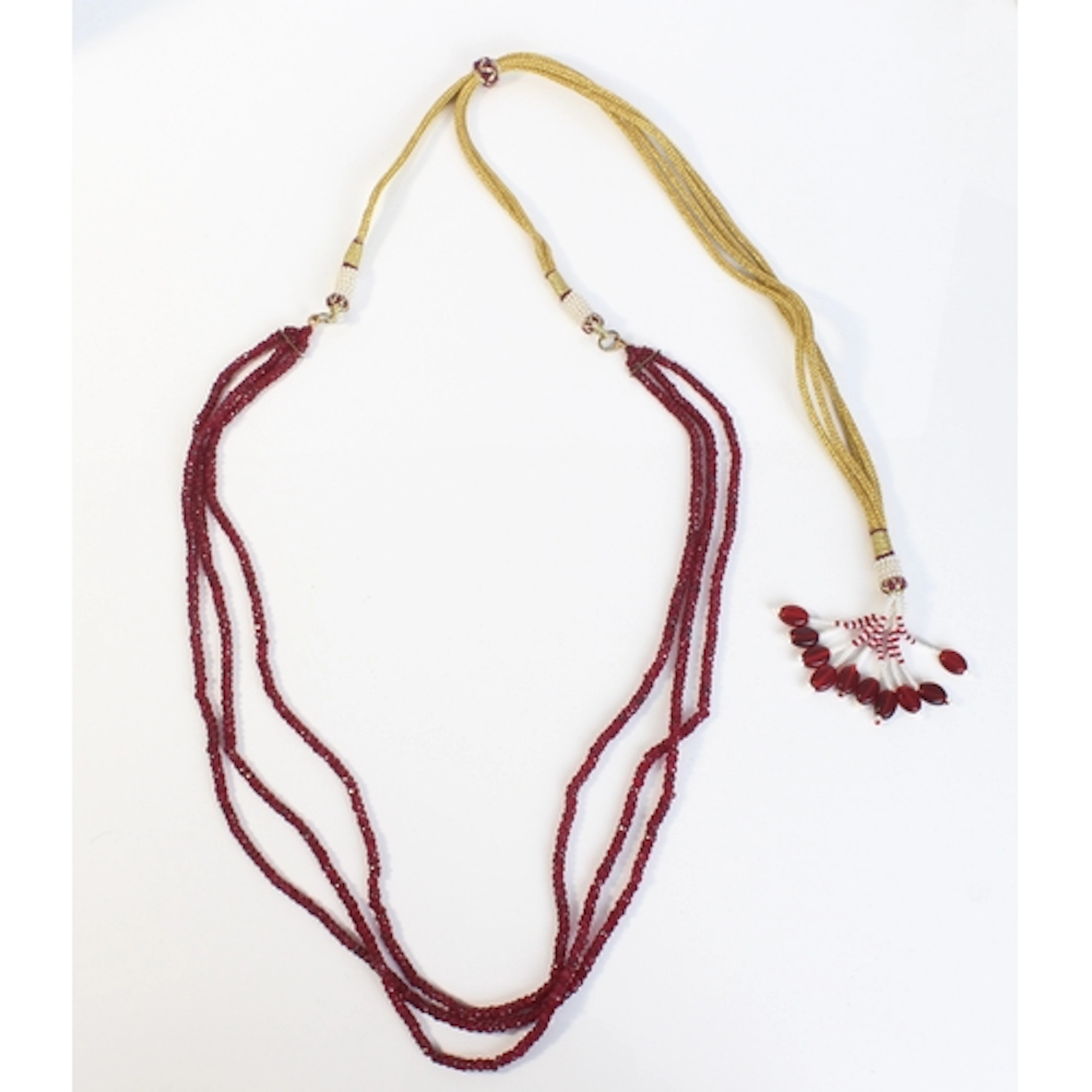 A ruby bead three-strand necklace - with strings of small fa...