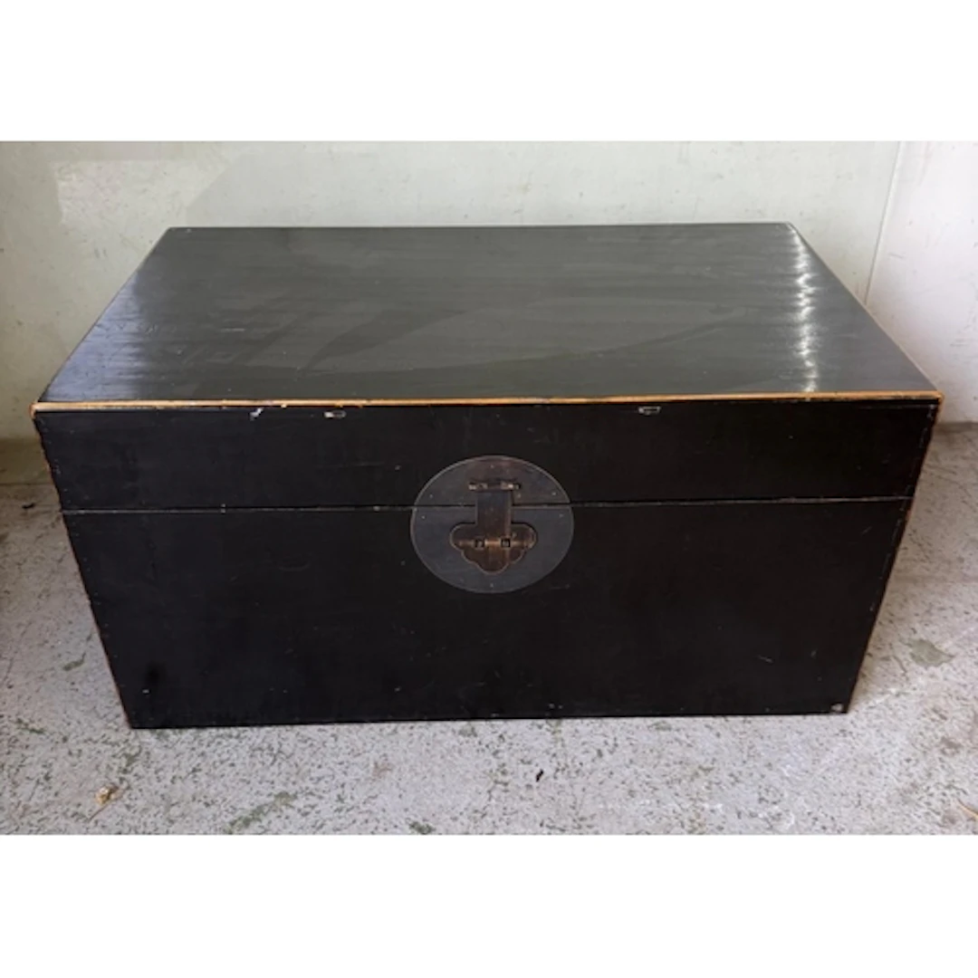 A black lacquer style trunk with handles to sides. Height 40...