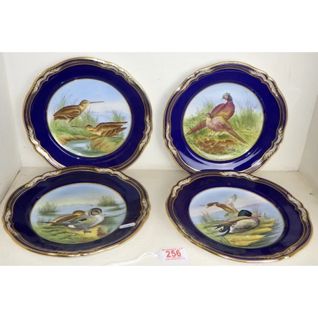 A set of four Spode 'Game Birds' cabinet plates