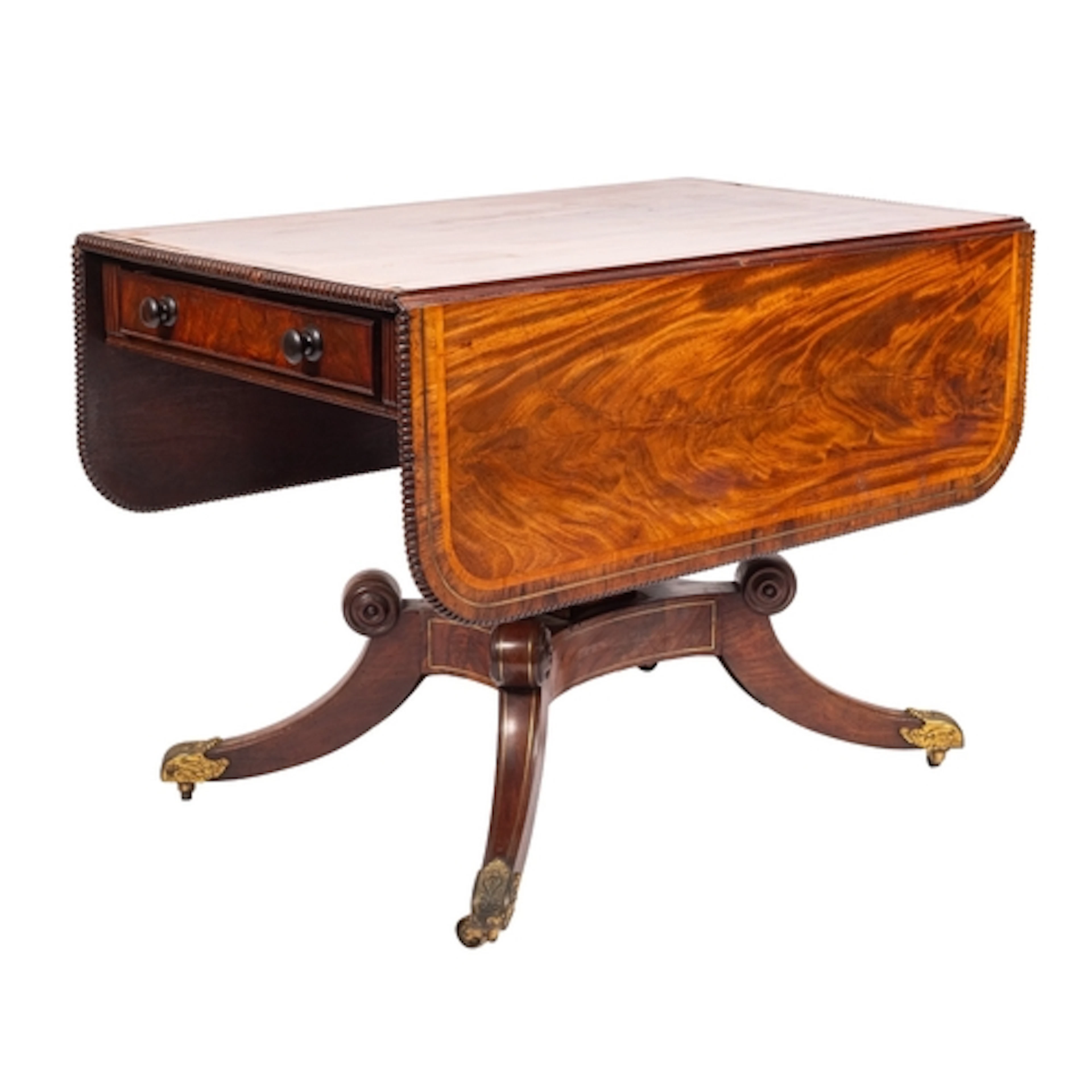 A George IV mahogany and crossbanded sofa table, circa 1825;...