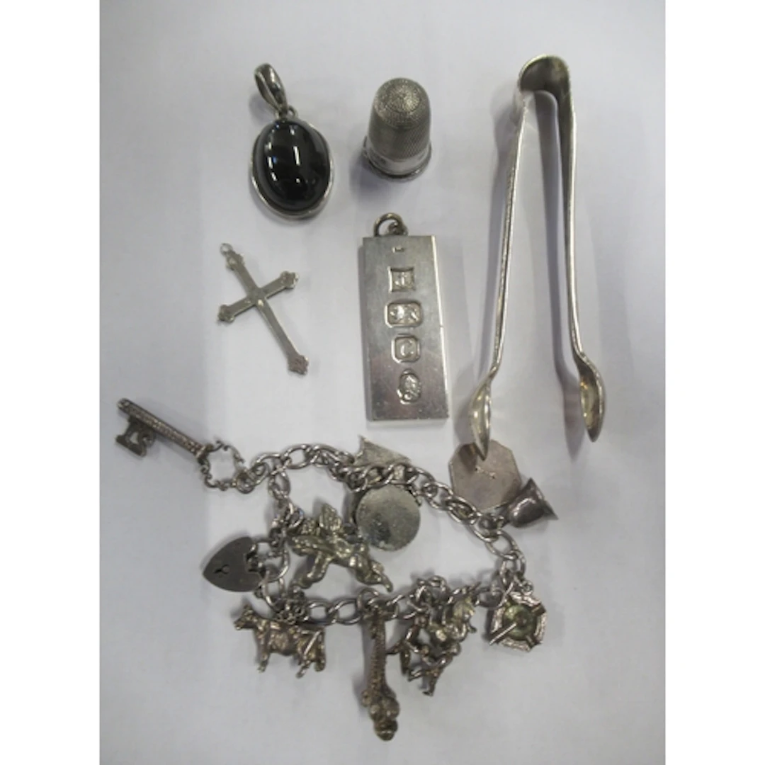 A collection of silver and other items