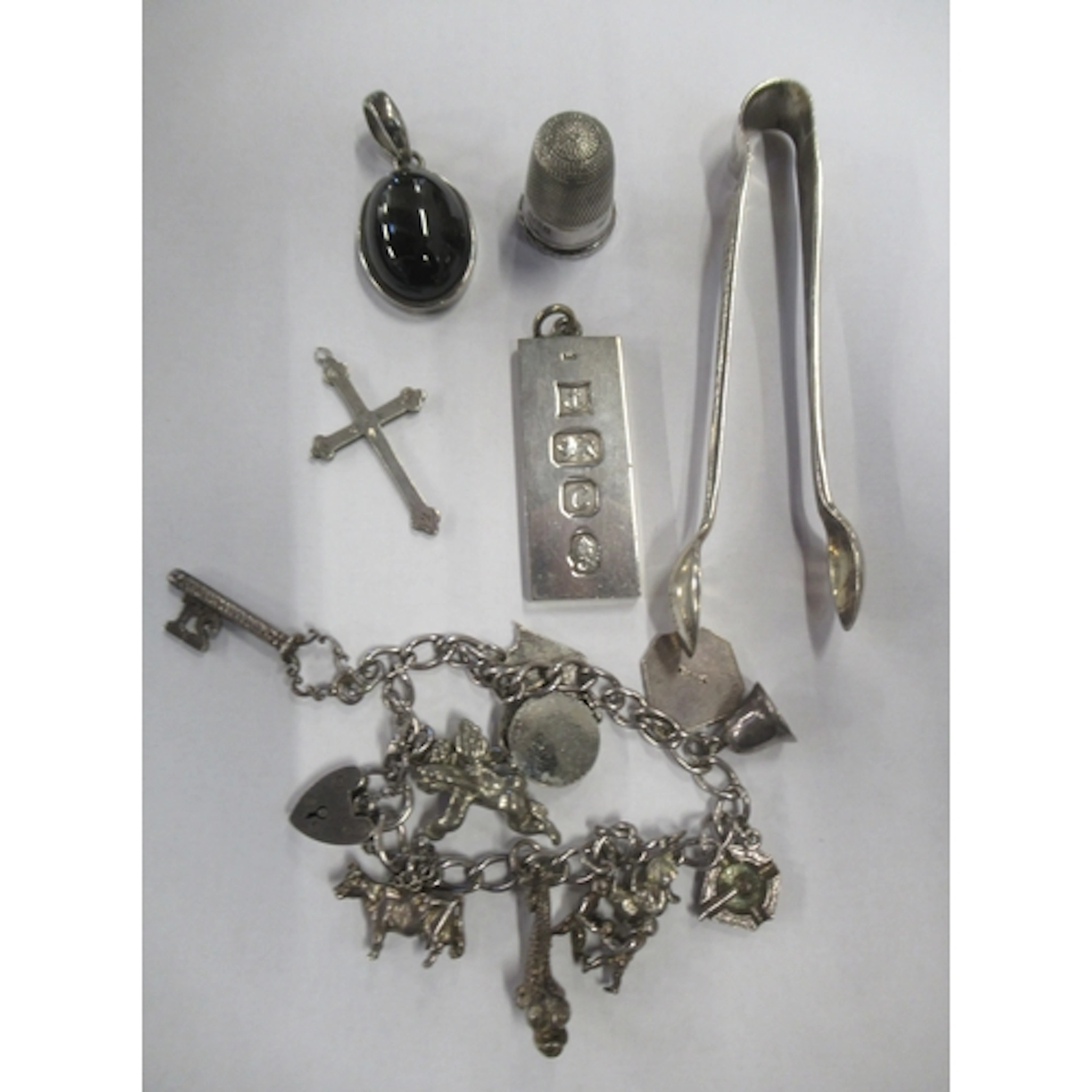 A collection of silver and other items