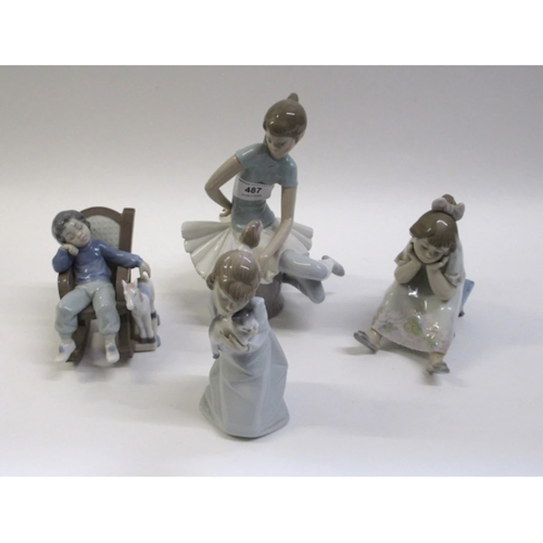 Four various Lladro figures of children, unboxed