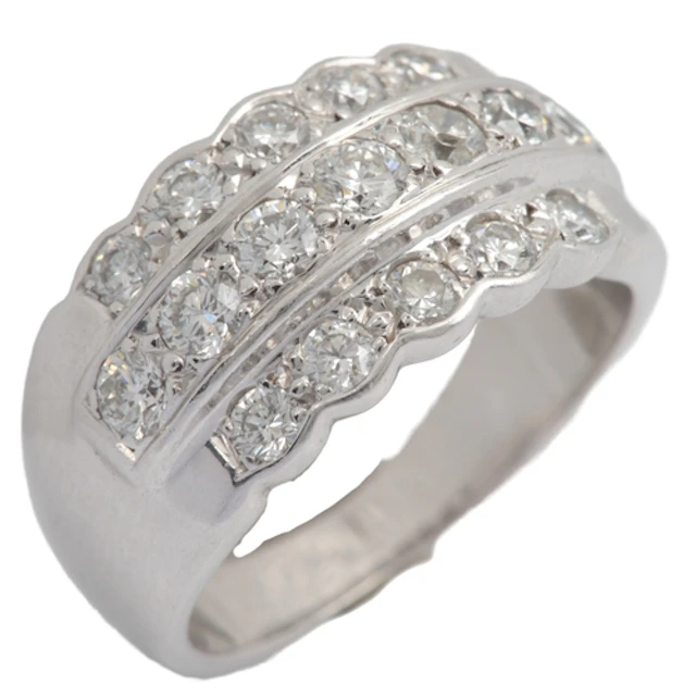 A diamond ring, set to the front with three rows of brillian...